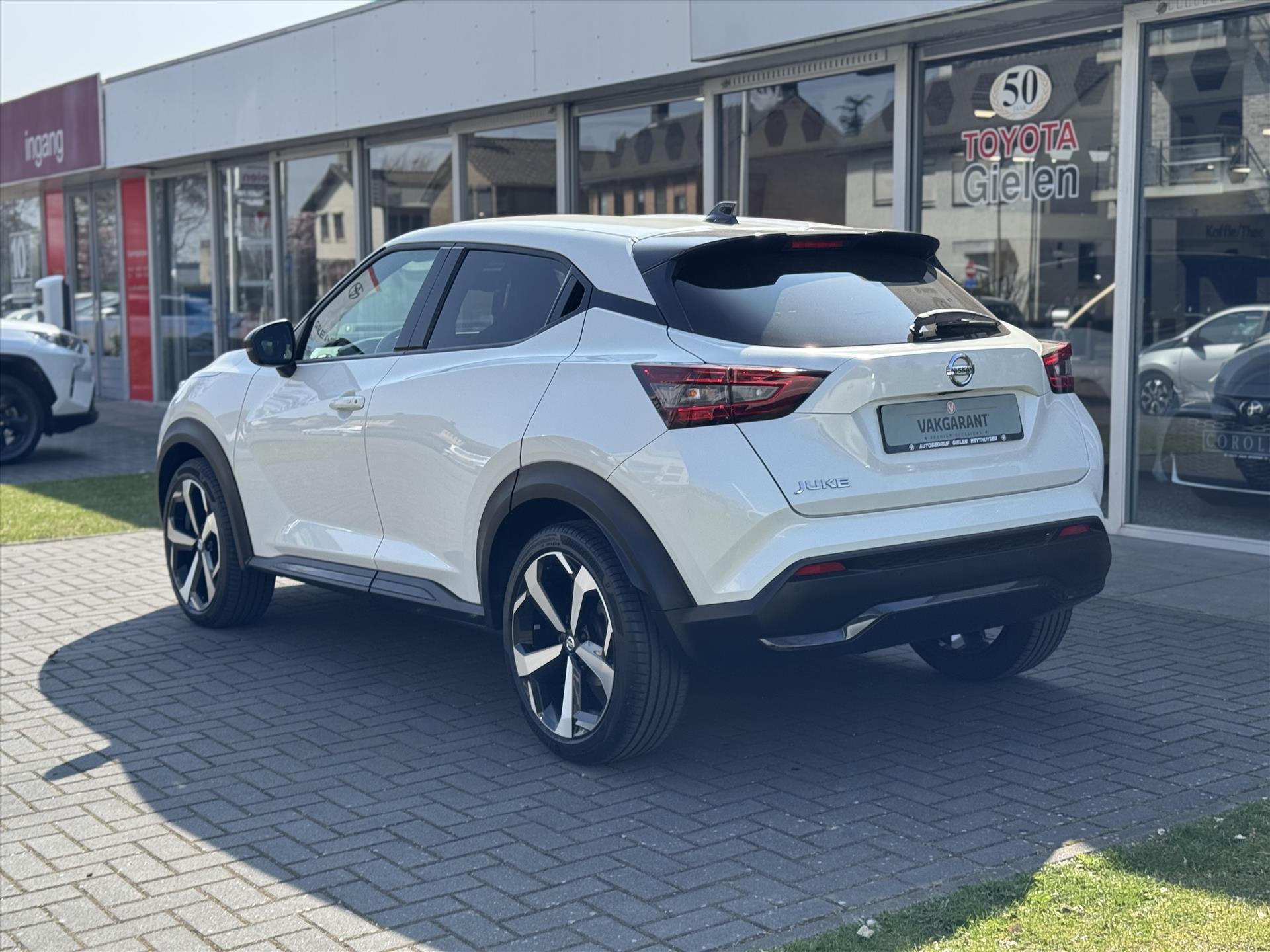 Nissan Juke 1.0 DIG-T 117pk DCT Tekna | Bose, Dodehoeksensor, 360 Camera, Keyless, Cruise control adaptief 43806208-2.jpg | Autobedrijf Gielen