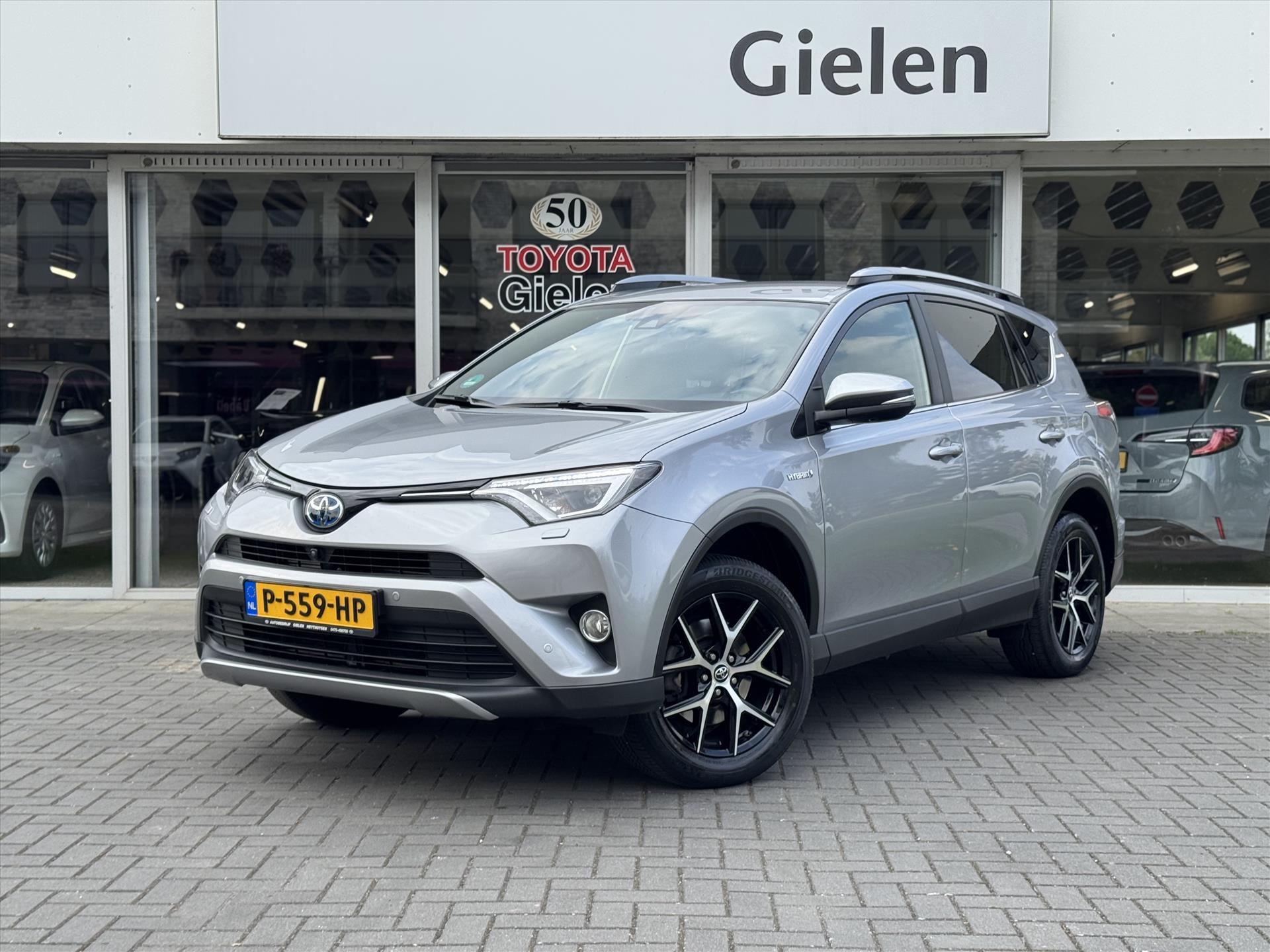 Toyota RAV4 2.5 Hybrid AWD Executive Business | 360 camera, Stoel/stuurverwarming, Adaptive cruise control, Navigatie, 1.650KG trekgewicht 44674677-0.jpg | Autobedrijf Gielen