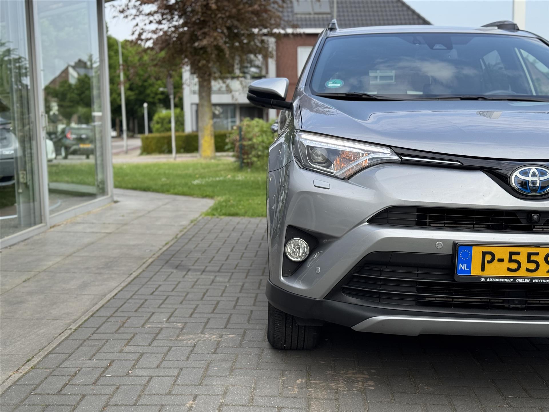 Toyota RAV4 2.5 Hybrid AWD Executive Business | 360 camera, Stoel/stuurverwarming, Adaptive cruise control, Navigatie, 1.650KG trekgewicht 44674677-4.jpg | Autobedrijf Gielen