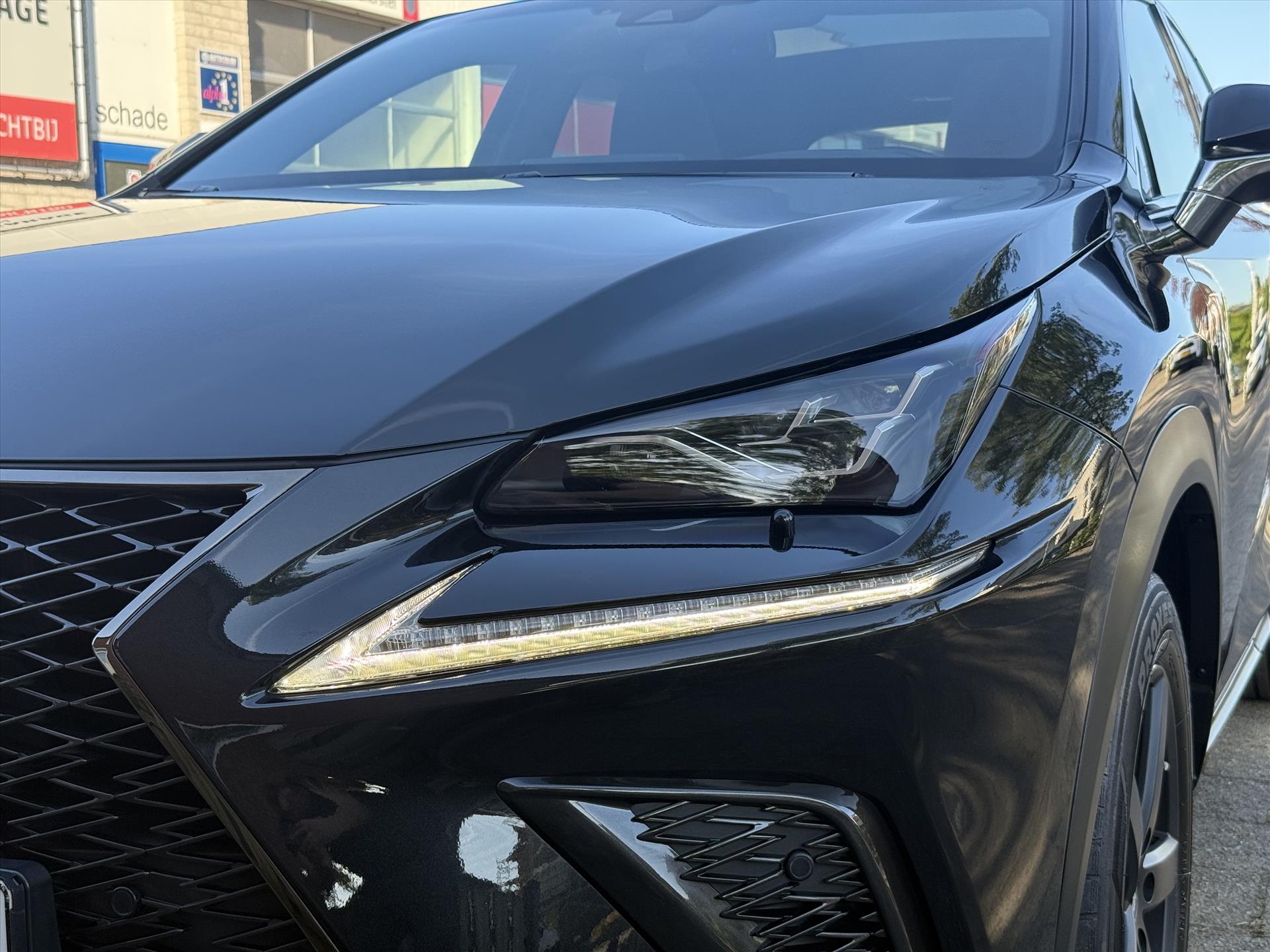 Lexus NX 300h AWD F Sport Line | Trekhaak, Panoramadak, Facelift, Leer, Stoelverwarming, Head up display, Dodehoekherkenning, 1500KG Trek 44859847-4.jpg | Autobedrijf Gielen