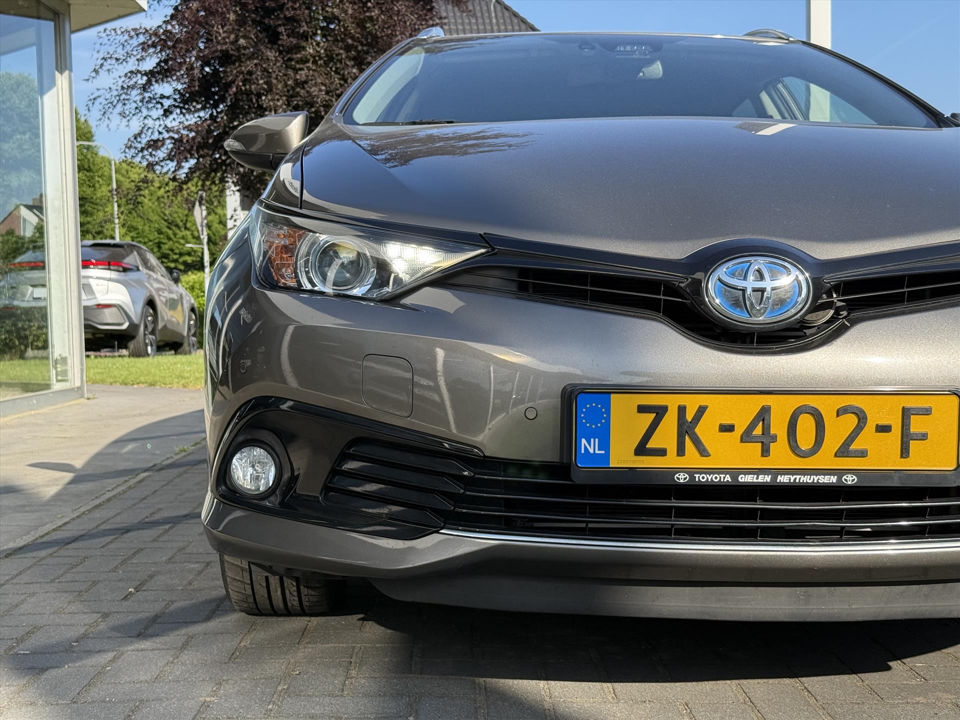 Toyota Auris Touring Sports 1.8 Hybrid Dynamic Ultimate | Eerste eigenaar, 17 inch, Stoelverwarming, Navigatie, Keyless, DAB 44982743-1.jpg | Autobedrijf Gielen