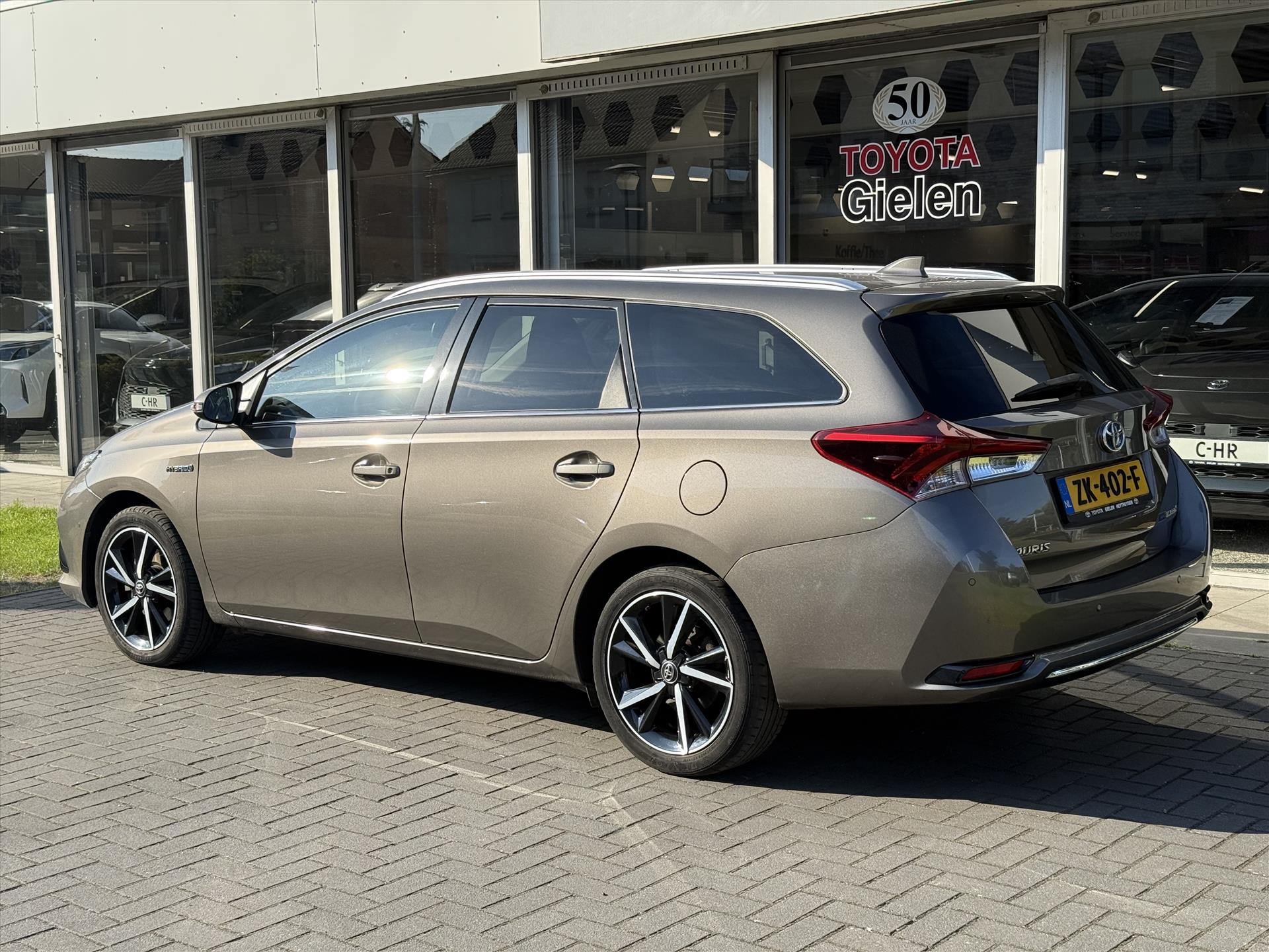 Toyota Auris Touring Sports 1.8 Hybrid Dynamic Ultimate | Eerste eigenaar, 17 inch, Stoelverwarming, Navigatie, Keyless, DAB 44982743-2.jpg | Autobedrijf Gielen