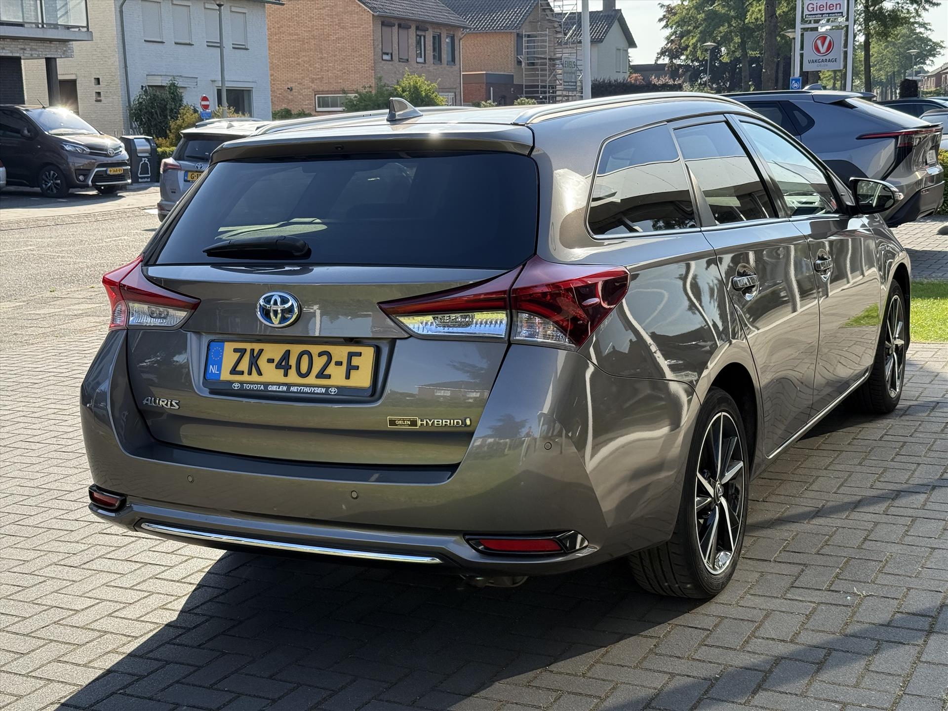 Toyota Auris Touring Sports 1.8 Hybrid Dynamic Ultimate | Eerste eigenaar, 17 inch, Stoelverwarming, Navigatie, Keyless, DAB 44982743-4.jpg | Autobedrijf Gielen