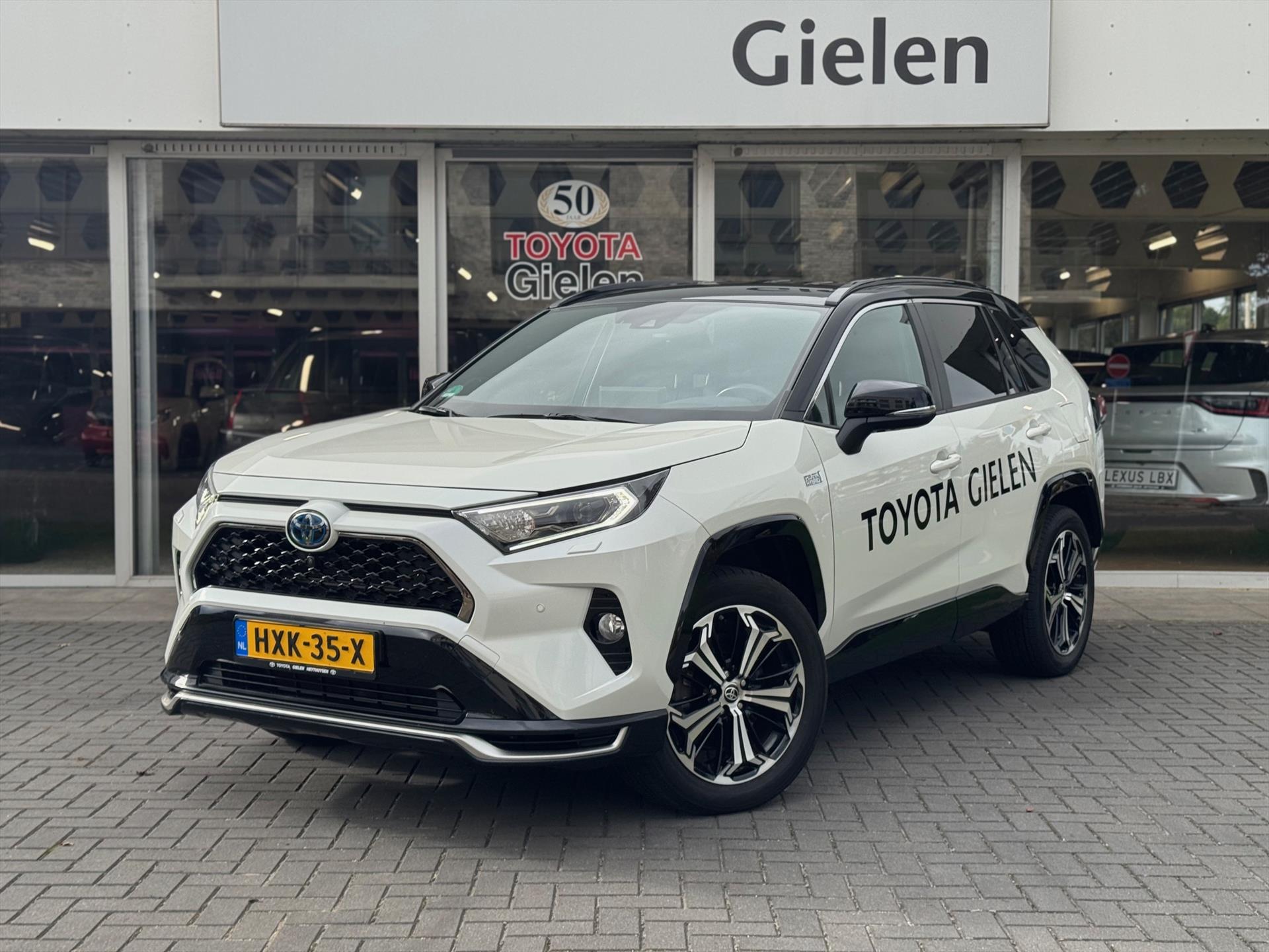Toyota RAV4 2.5 Plug-in Hybrid AWD Bi-Tone Plus | Head up display, JBL, Leer, Geheugenfunctie, 360 camera, Stuurverwarming, Blind Spot 45337651-0.jpg | Autobedrijf Gielen