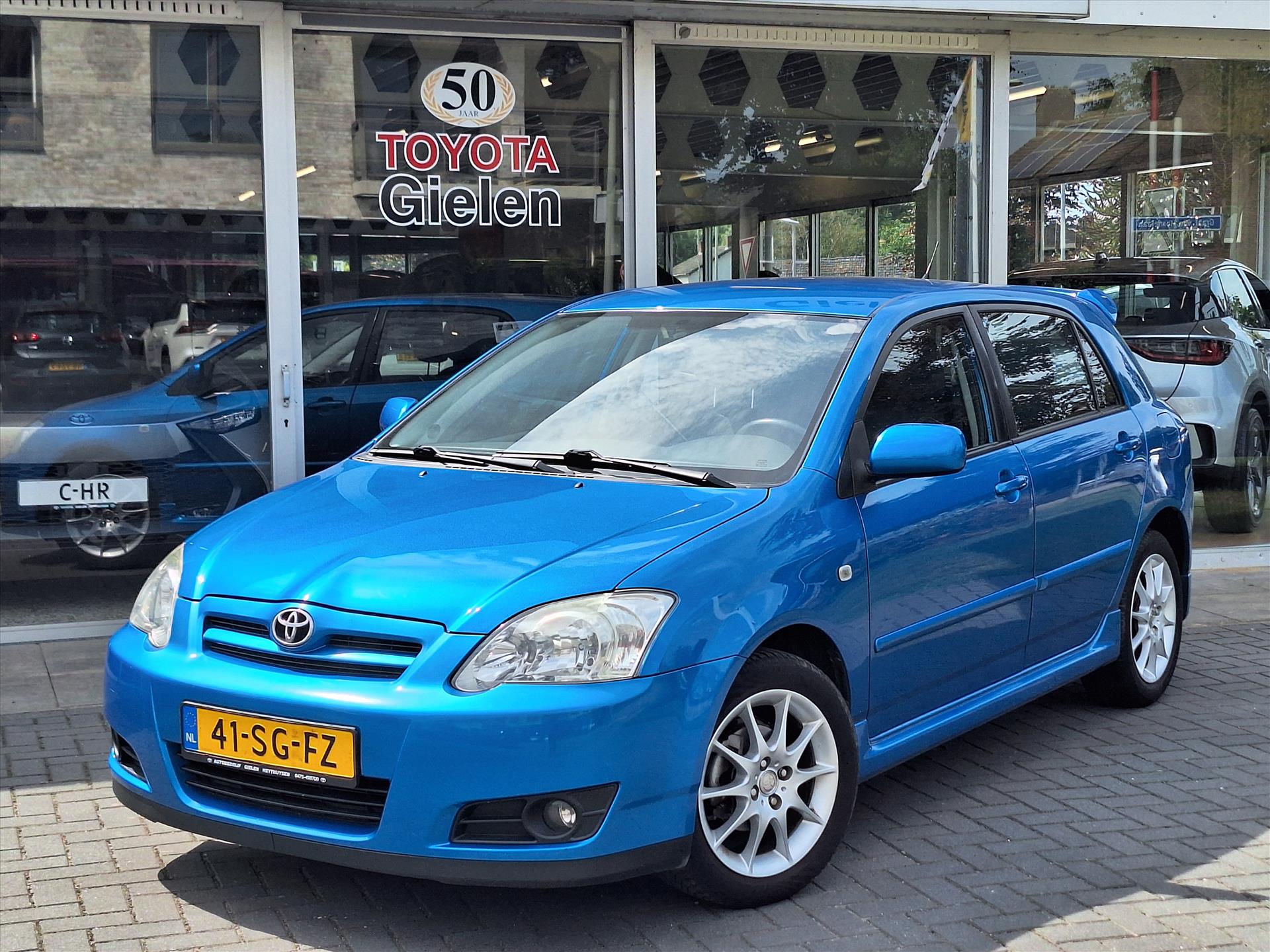 Toyota Corolla 1.6 VVT-I Anniversary | Cruise Control, Spoiler, Lichtmetalen velgen, Climate Control, Nieuw geleverd! 46155903-1.jpg | Autobedrijf Gielen