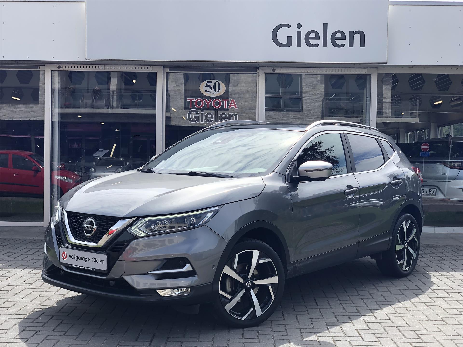 Nissan QASHQAI 1.2 DIG-T Tekna+ | Eerste eigenaar, Trekhaak, Bose, 360 Camera, Leer, Stoelverwarming, LED, Panoramadak, Navigatie 46796469-0.jpg | Autobedrijf Gielen