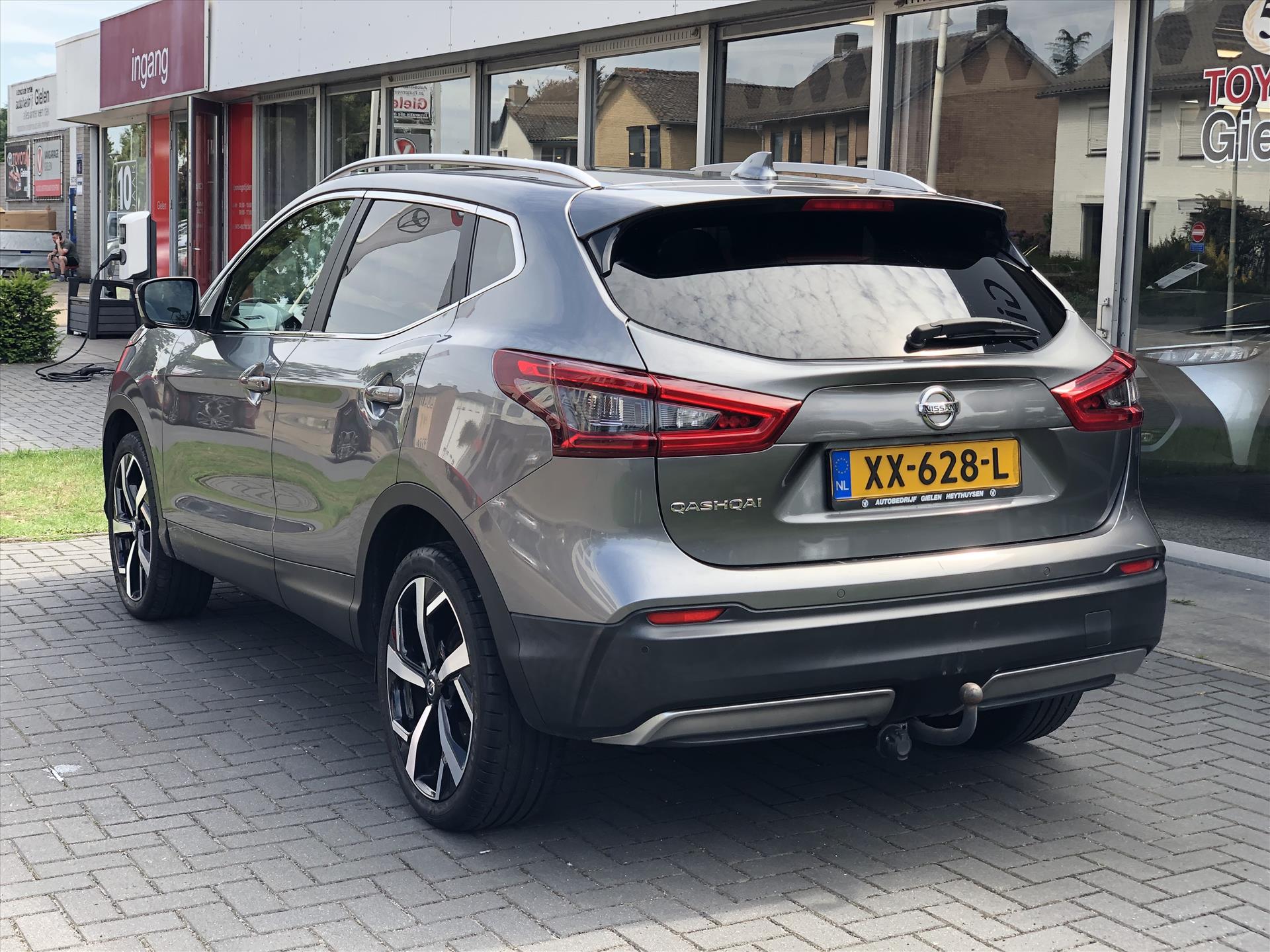 Nissan QASHQAI 1.2 DIG-T Tekna+ | Eerste eigenaar, Trekhaak, Bose, 360 Camera, Leer, Stoelverwarming, LED, Panoramadak, Navigatie 46796469-4.jpg | Autobedrijf Gielen
