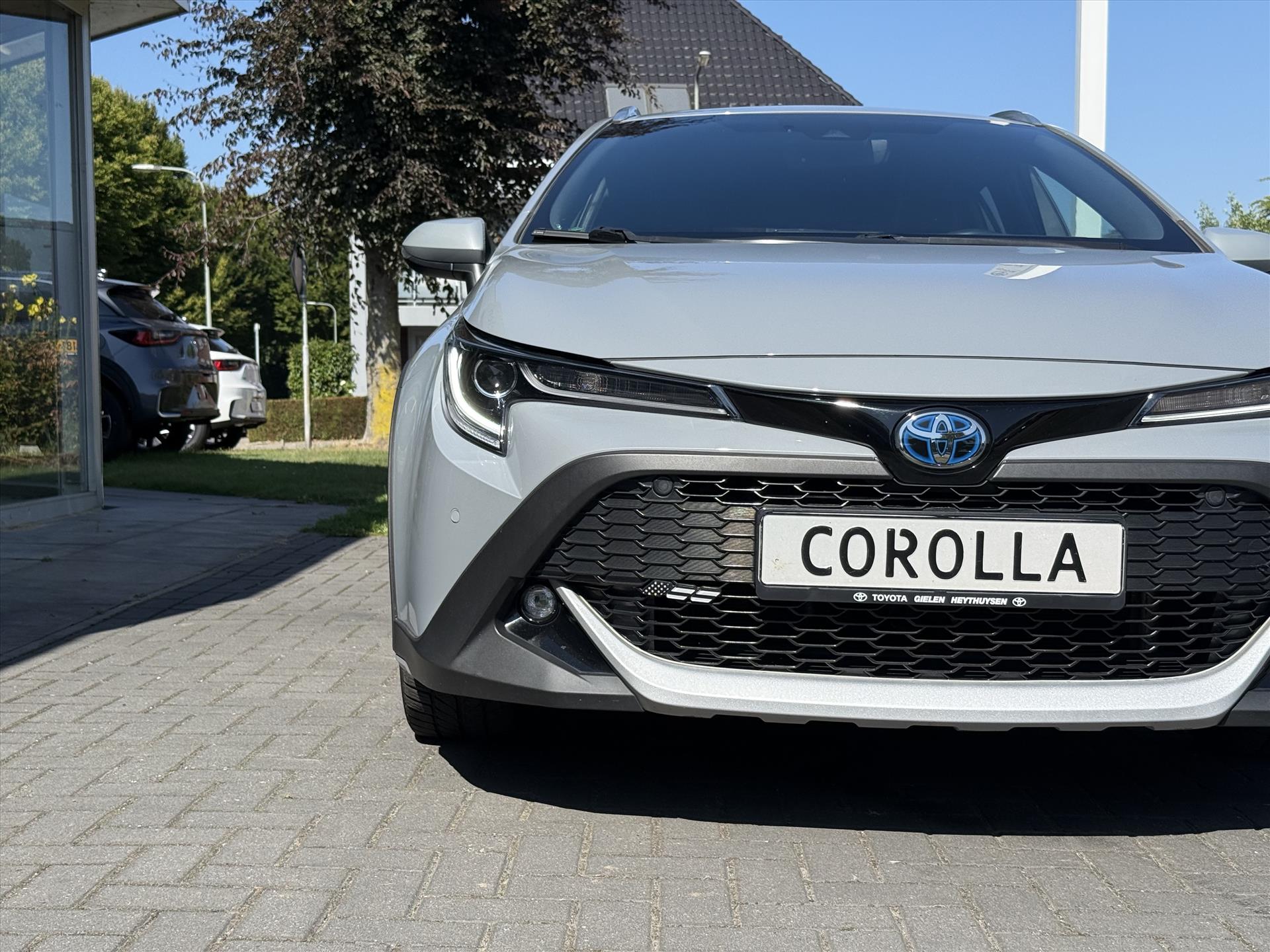 Toyota Corolla Touring Sports 1.8 Hybrid TREK | Parkeersensoren, Navigatie, Apple CarPlay/Android Auto, Stoel + Stuurverwarming 46871412-4.jpg | Autobedrijf Gielen