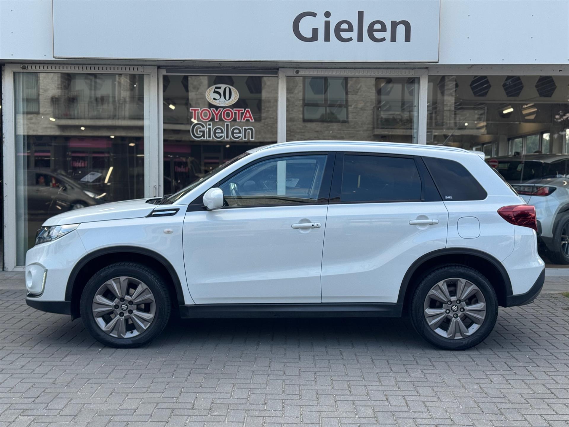 Suzuki Vitara 1.4 Boosterjet Smart Hybrid Automaat Select | Trekhaak, Apple CarPlay/Android Auto, Stoelverwarming, Adaptive cruise control, 1. 47830302-1.jpg | Autobedrijf Gielen
