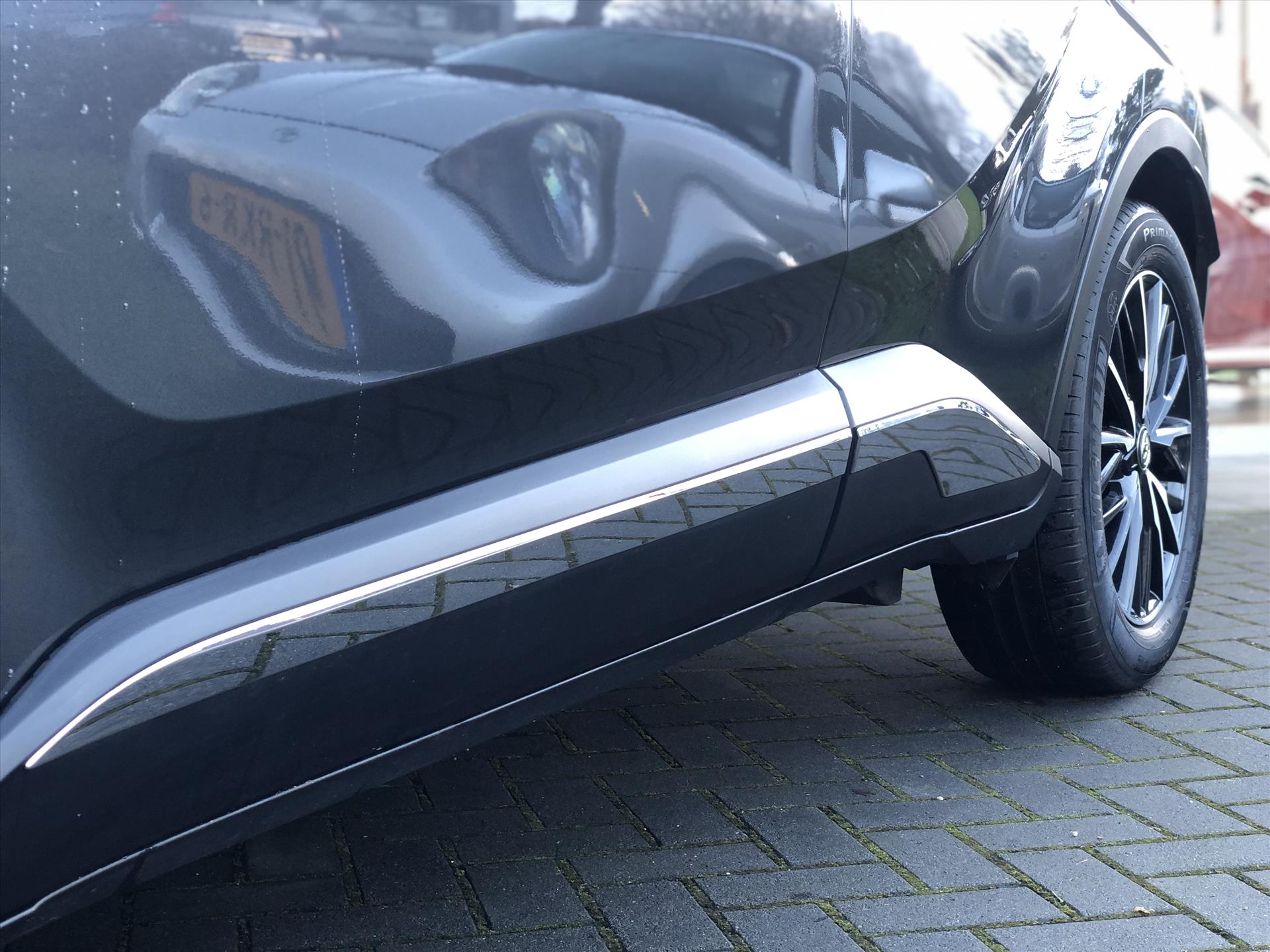 Toyota C-HR 1.8 Hybrid Executive | Navigatie, Half Leer, Parkeersensoren, Stoelverwarming, Keyless, 18 inch, Perfecte staat! 48297348-2.jpg | Autobedrijf Gielen