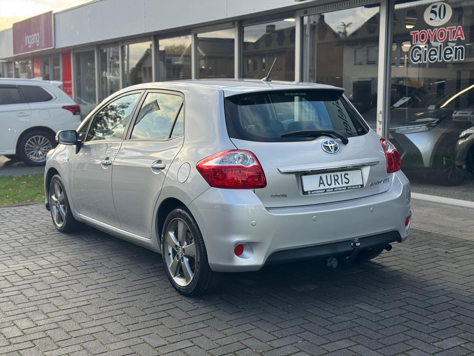 Toyota Auris 1.8 Full Hybrid Executive | Eerste eigenaar, Trekhaak, Navigatie, Keyless, 17 inch, Camera, Cruise control, Nieuw geleverd & ond 48610627-2.jpg | Autobedrijf Gielen