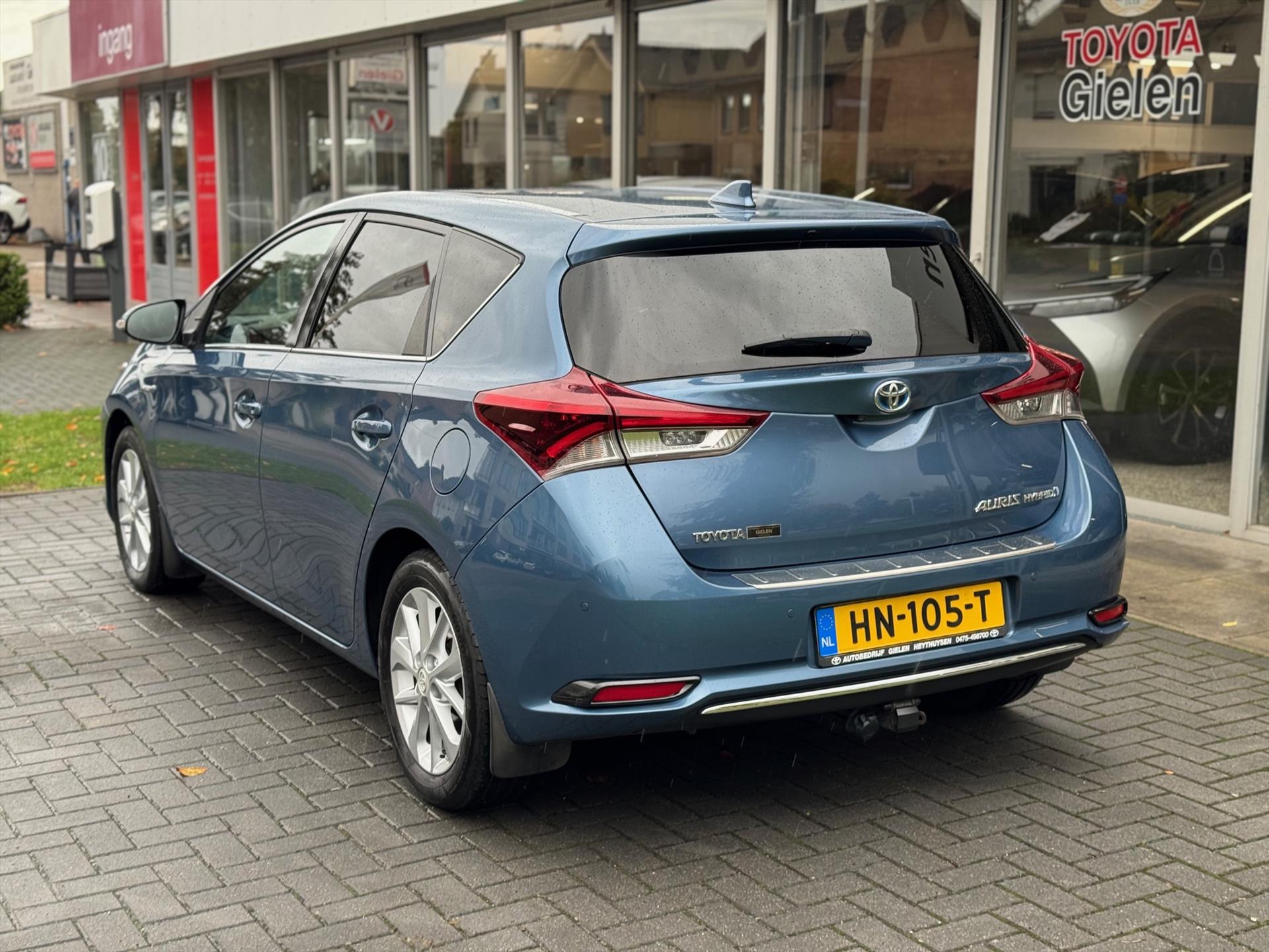 Toyota Auris 1.8 Hybrid Executive | Eerste eigenaar, Trekhaak, Half leer, Navigatie, Stoelverwarming, Parkeersensoren, Top onderhouden! 48668885-2.jpg | Autobedrijf Gielen