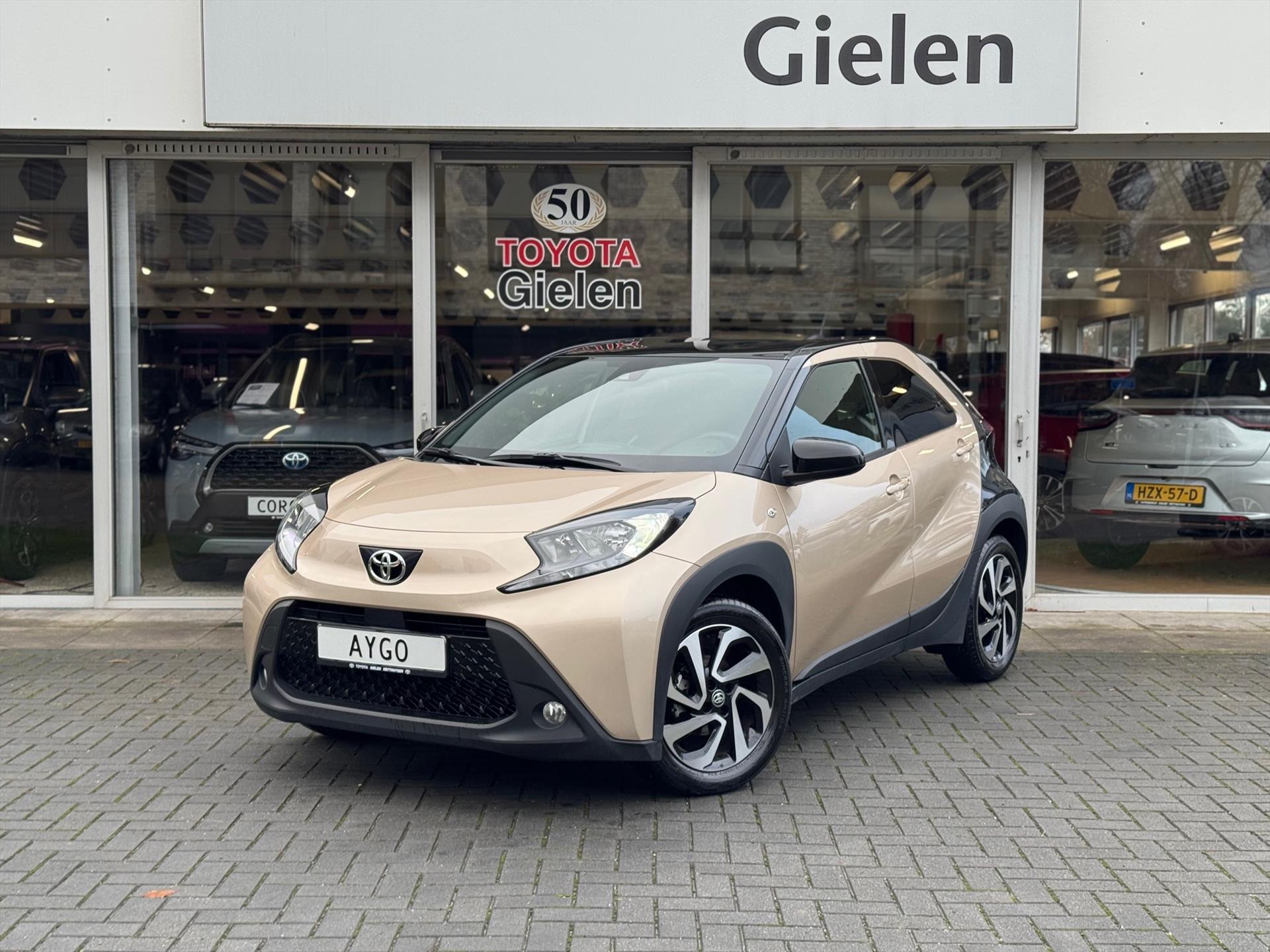 Toyota Aygo X 1.0 VVT-i MT Pulse Bi-tone | Ginger beige, 17 inch, Privacy glass, Apple CarPlay/Android auto, Airconditioning, Parkeercamera 49020702-0.jpg | Autobedrijf Gielen