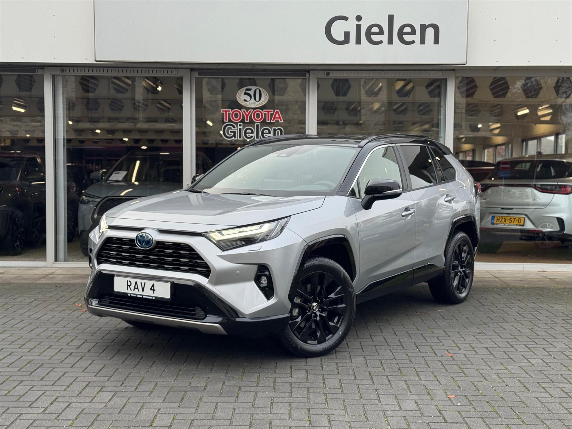 Toyota RAV4 2.5 Hybrid AWD Bi-Tone | Stoel + stuurverwarming, Elektrische achterklep, Apple carplay/Android auto, Groot scherm 49293832-0.jpg | Autobedrijf Gielen