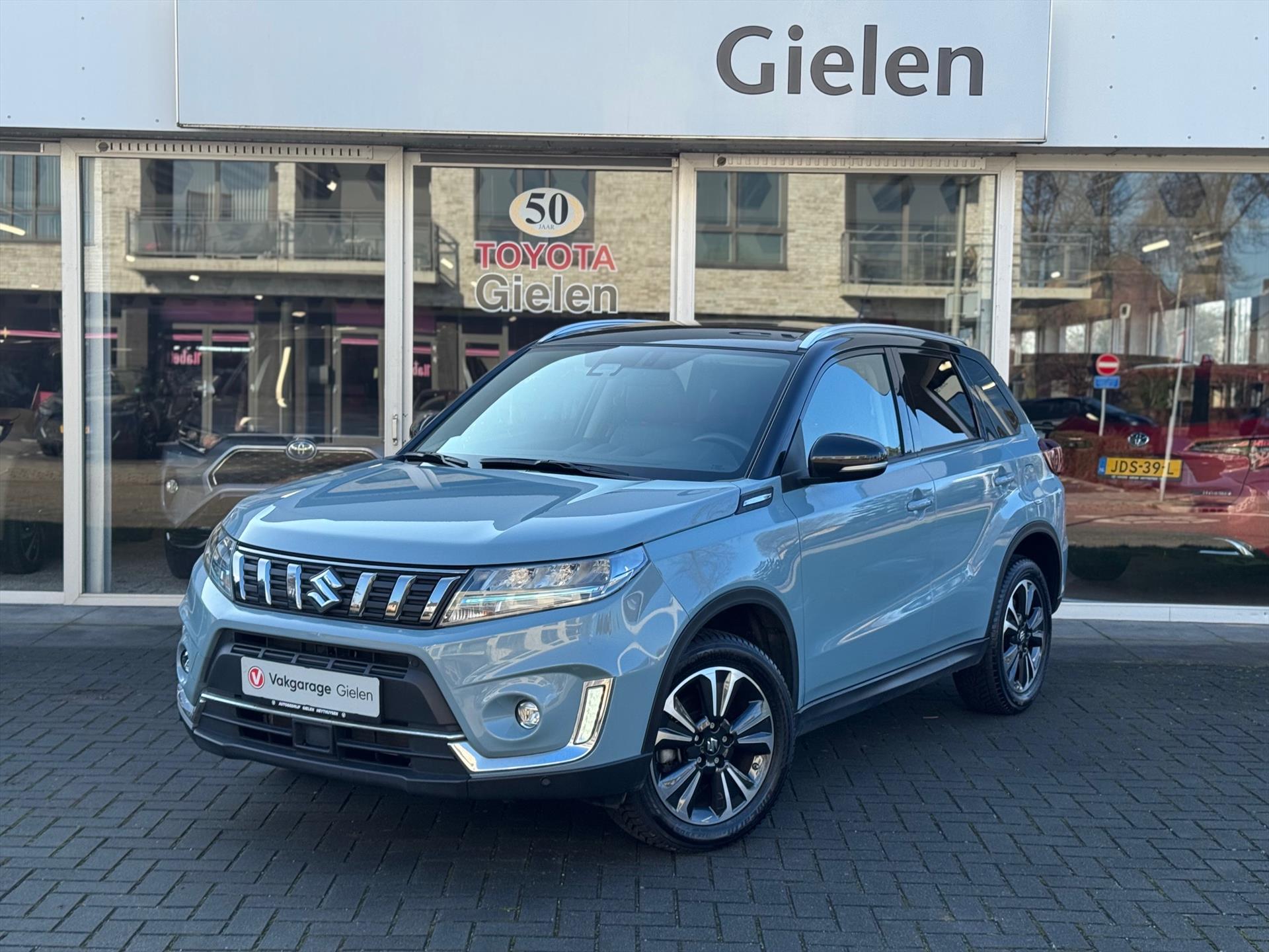 Suzuki Vitara 1.5 Hybrid Automaat Style | Bi-Tone, Dodehoekherkenning, Stoelverwarming, Parkeersensoren, Lage Km-stand 50964054-0.jpg | Autobedrijf Gielen