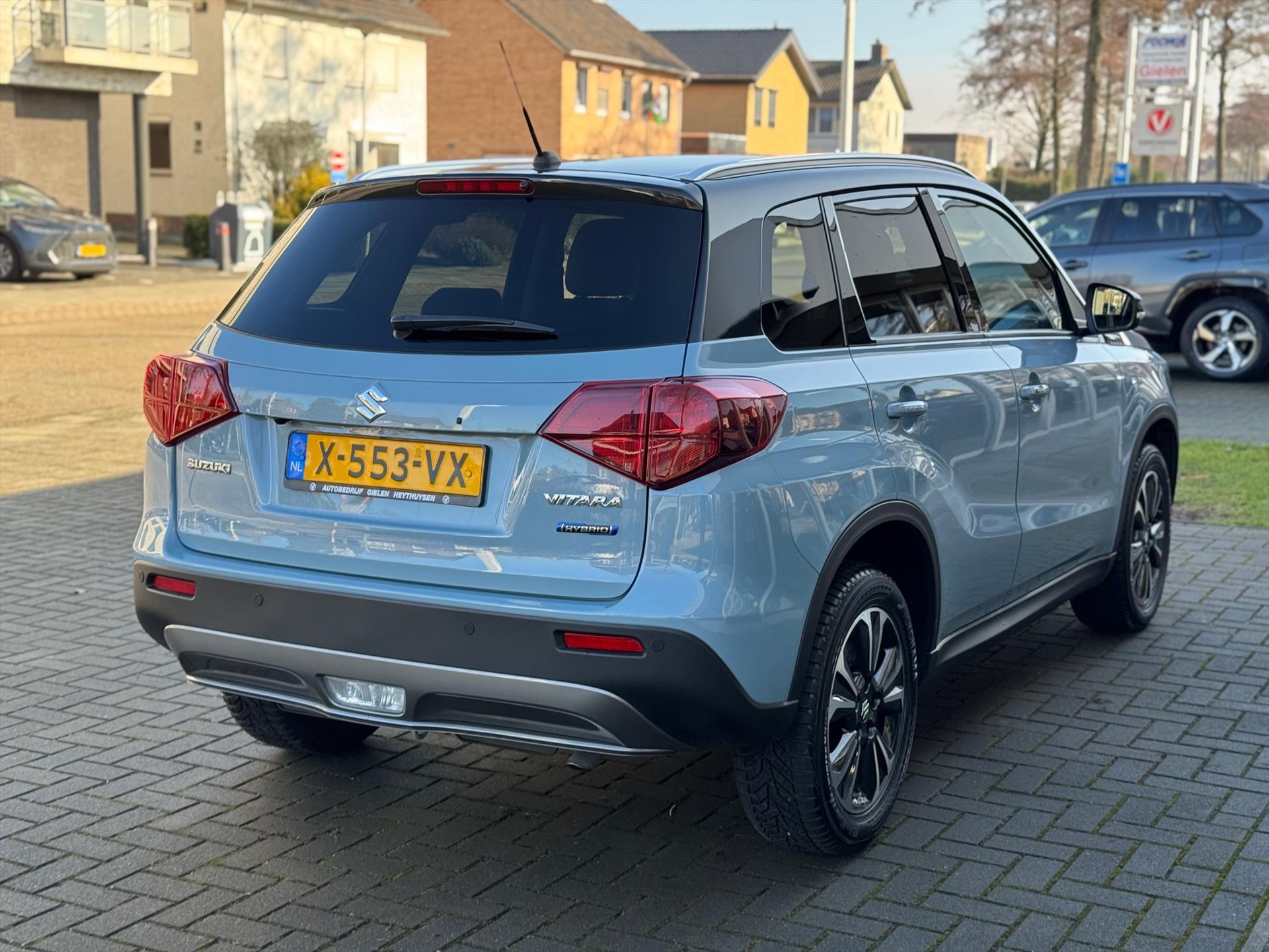 Suzuki Vitara 1.5 Hybrid Automaat Style | Bi-Tone, Dodehoekherkenning, Stoelverwarming, Parkeersensoren, Lage Km-stand 50964054-3.jpg | Autobedrijf Gielen