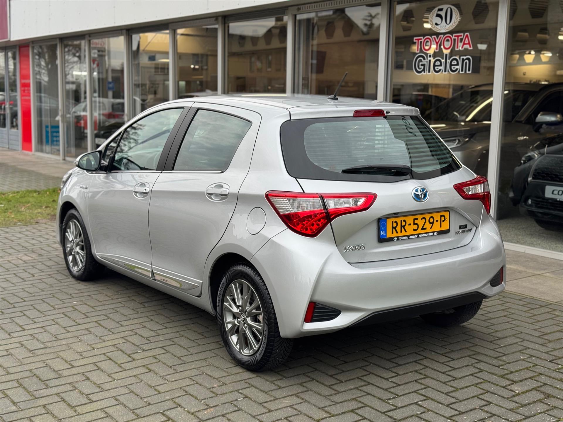 Toyota Yaris 1.5 Hybrid Executive | Lichtmetalen velgen, Half leer, Navigatie, Cruise control, Armsteun, Startknop, Safety sense 50989696-3.jpg | Autobedrijf Gielen