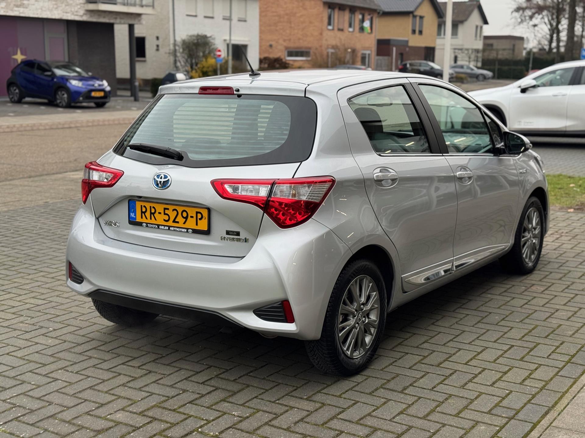 Toyota Yaris 1.5 Hybrid Executive | Lichtmetalen velgen, Half leer, Navigatie, Cruise control, Armsteun, Startknop, Safety sense 50989696-4.jpg | Autobedrijf Gielen