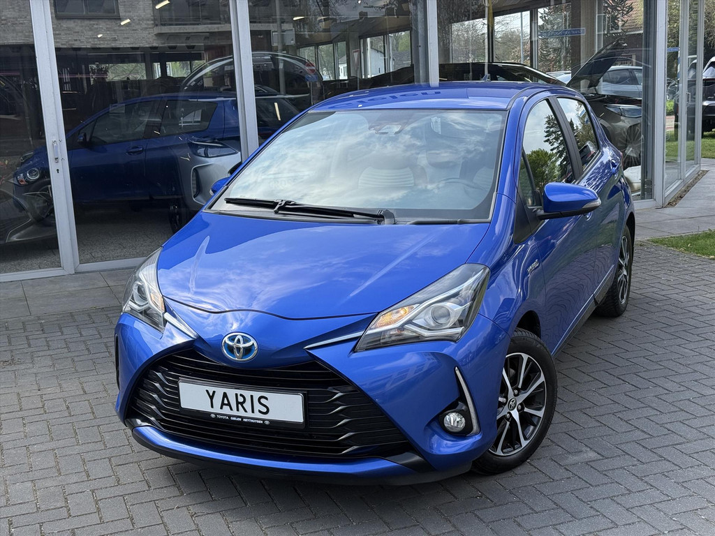 Toyota Yaris 1.5 Full HybridDynamic | Lichtmetalen velgen, Parkeercamera, Licht + Regensensor, Cruise control, Climate control 52400049-1.jpg | Autobedrijf Gielen