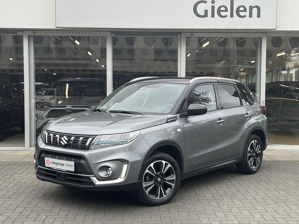 Suzuki Vitara 1.5 Hybrid Automaat Select Bi-Tone | Eerste eigenaar, Trekhaak, Dodehoekherkenning, Stoelverwarming, 17 inch, LED 52682892-0.jpg | Autobedrijf Gielen