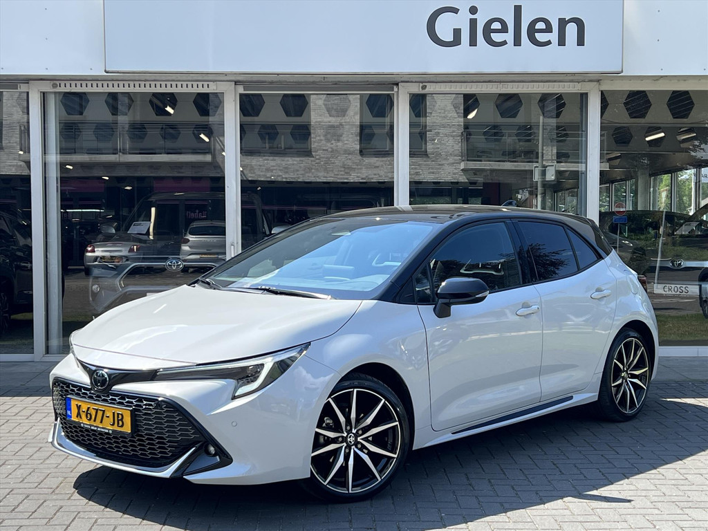 Toyota Corolla 1.8 Hybrid GR Sport | Eerste eigenaar, Parkeersensoren, Stoelverwarming, 18inch, Dynamic Grey, Nieuwe multimedia 53313666-0.jpg | Autobedrijf Gielen