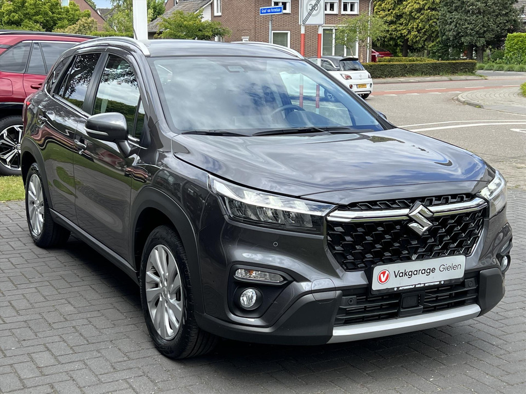 Suzuki S-Cross 1.4 Boosterjet Smart Hybrid Select | Trekhaak, Dodehoekherkenning, Stoelverwarming, Parkeersensoren, 1.500KG Trekgewicht 53366236-4.jpg | Autobedrijf Gielen