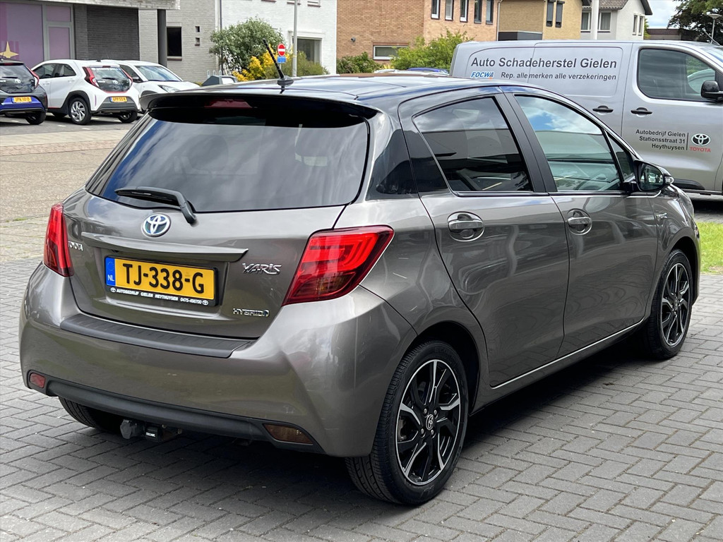 Toyota Yaris 1.5 Full Hybrid Bi-Tone Plus | Trekhaak, Panoramadak, Navigatie, Keyless, 16 inch, Cruise control, Armsteun, Spoiler, Privacy gl 53481961-3.jpg | Autobedrijf Gielen