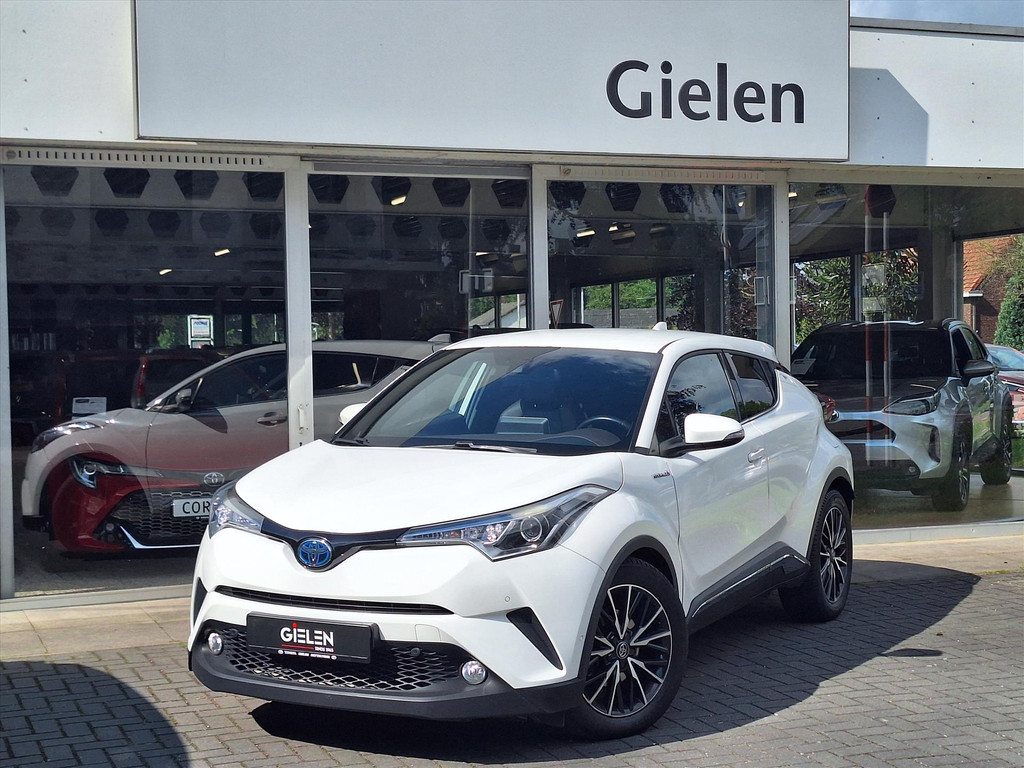 Toyota C-HR 1.8 Hybrid First Edition | JBL, 18 inch, Parkeersensoren, Stoelverwarming, Half Leer, Keyless, DAB, 2e eigenaar 53689485-1.jpg | Autobedrijf Gielen