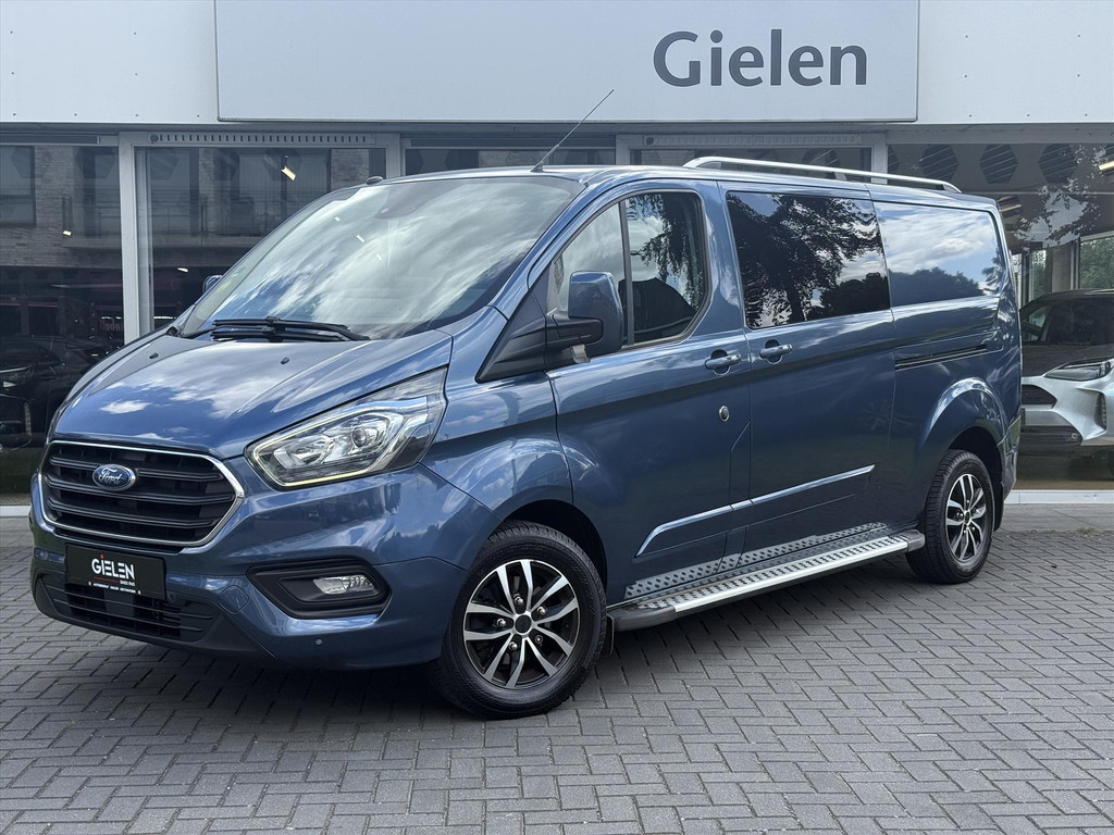 Ford Transit Custom GB 2.0 TDCi 170PK 340 L2H1 Limited | Navigatie, Parkeersensoren, Roofrails, Trekhaak, Dubbele Cabine, Dubbele schuifdeur 54227687-0.jpg | Autobedrijf Gielen