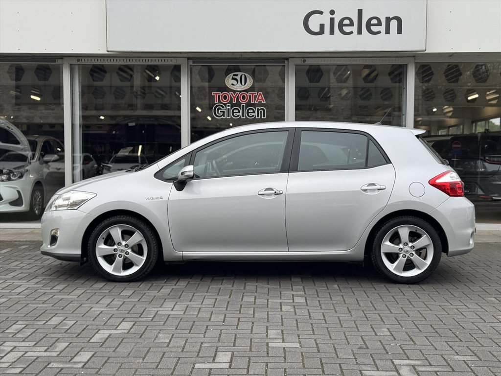 Toyota Auris 1.8 Full Hybrid Dynamic | Trekhaak, Navigatie, Parkeercamera, Cruise control, Parkeersensoren, Climate control 54861132-1.jpg | Autobedrijf Gielen