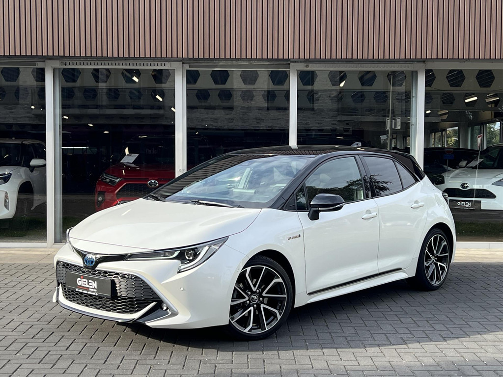 Toyota Corolla 1.8 Hybrid Executive | Parelmoer wit, 18 inch, Leer/Alcantara, Stoelverwarming, Parkeersensoren, Keyless, Apple CarPlay/Android 56487021-0.jpg | Autobedrijf Gielen