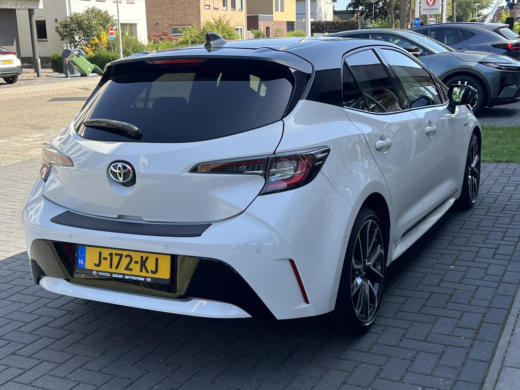 Toyota Corolla 1.8 Hybrid Executive | Parelmoer wit, 18 inch, Leer/Alcantara, Stoelverwarming, Parkeersensoren, Keyless, Apple CarPlay/Android 56487021-2.jpg | Autobedrijf Gielen