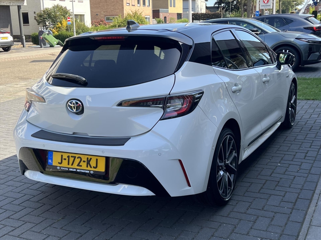 Toyota Corolla 1.8 Hybrid Executive | Parelmoer wit, 18 inch, Leer/Alcantara, Stoelverwarming, Parkeersensoren, Keyless, Apple CarPlay/Android 56487021-2.jpg | Autobedrijf Gielen