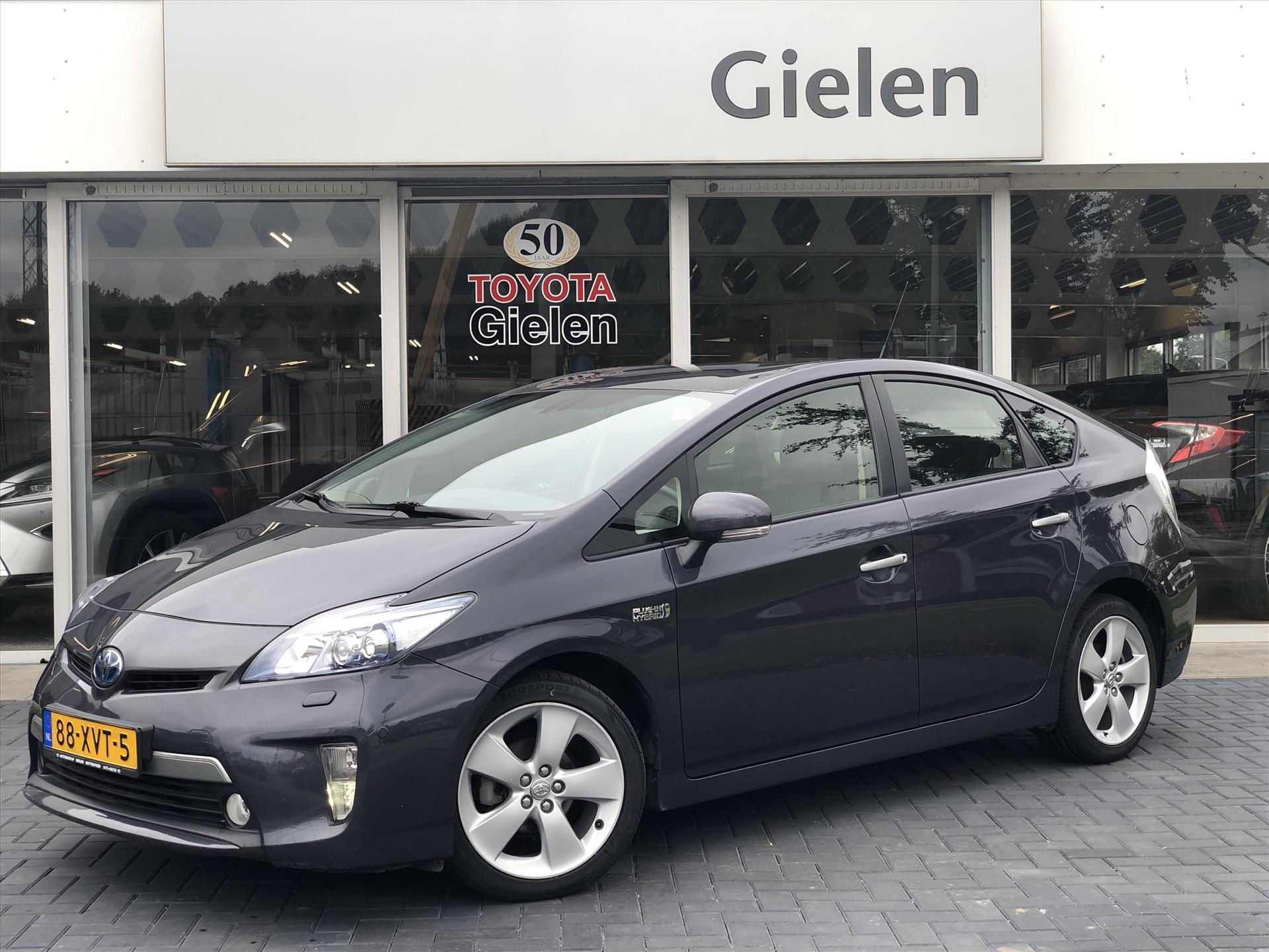 Toyota Prius 1.8 Plug-In Hybrid Executive Business | Navigatie, Leer, JBL, Adaptive Cruise control, Head up display, Stoelverwarming, BTW aut 34456644-0.jpg | Autobedrijf Gielen