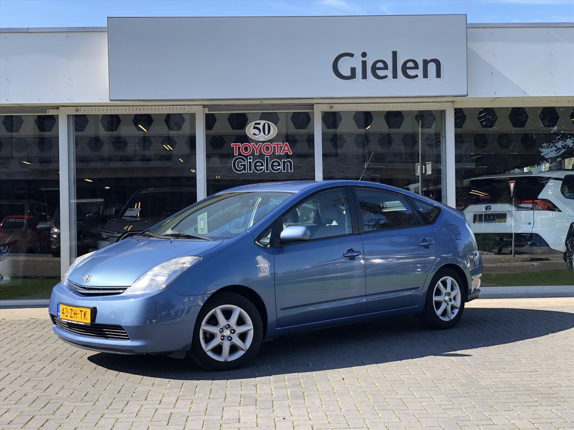 Toyota Prius 1.5 Comfort | Trekhaak, Groot scherm, Cruise control, Climate control, Zuinig, Automaat, Eerste eigenaar! 34975425-0.jpg | Autobedrijf Gielen
