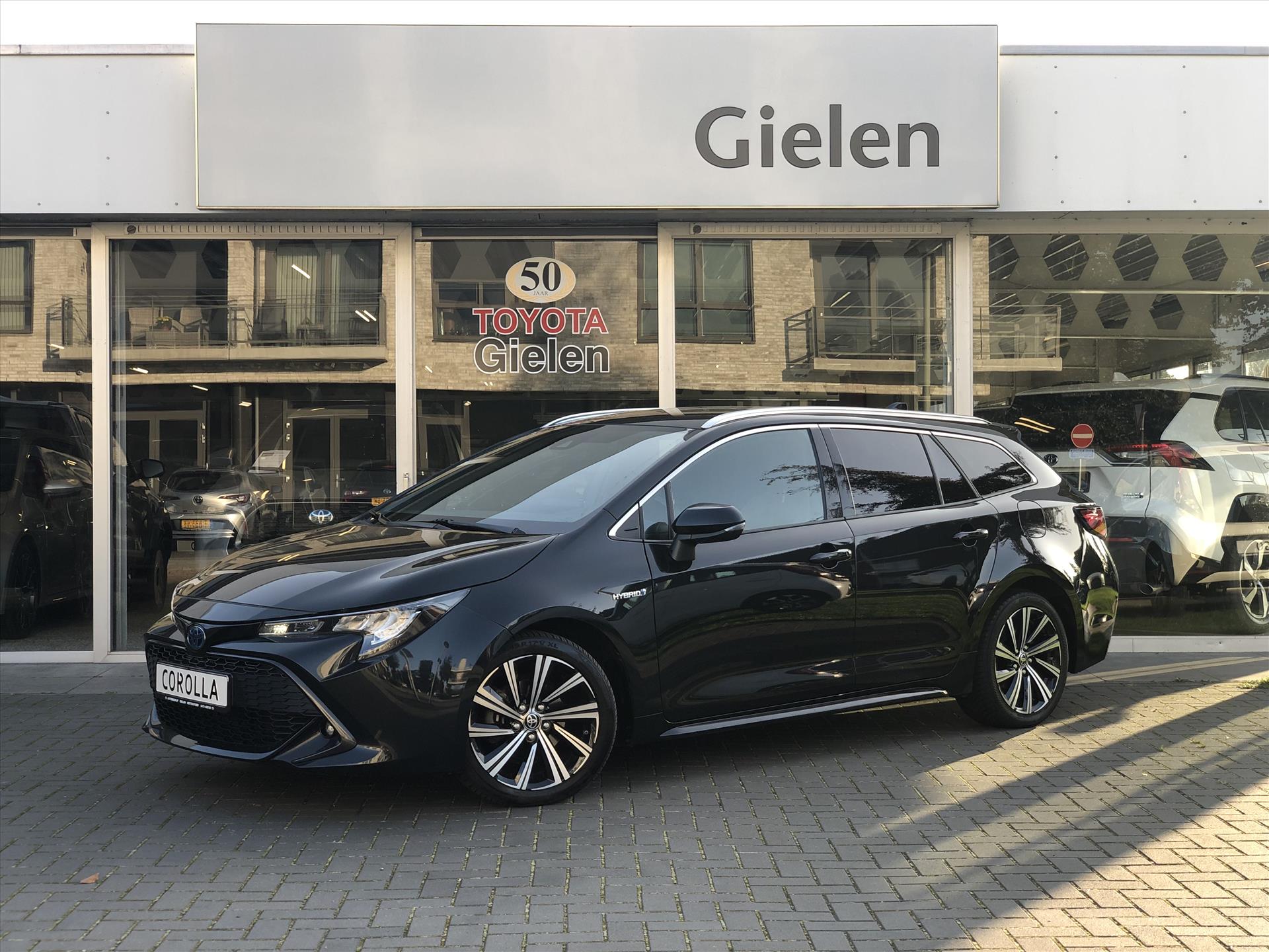 Toyota Corolla Touring Sports 1.8 Hybrid Dynamic | Eerste eigenaar, Leer/Stof, Stoelverwarming, Apple CarPlay/Android Auto, 17 inch, LED, BTW Auto 35495463-0.jpg | Autobedrijf Gielen