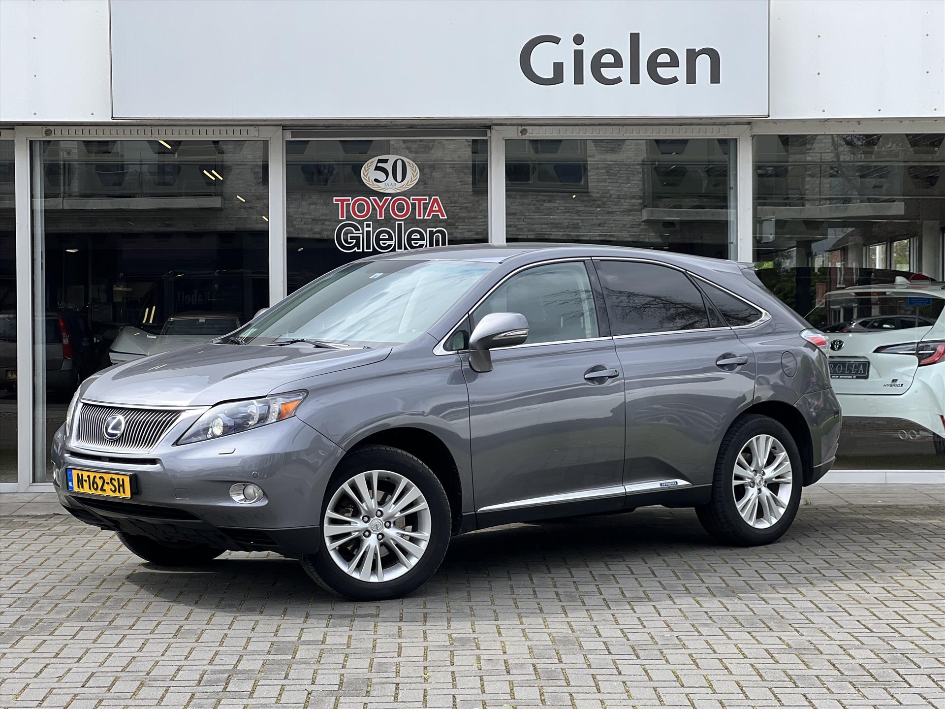 Lexus RX 450H 3.5 V6 4WD Luxury | Trekhaak, Leer, Geheugenfunctie, Navigatie, Keyless, Cruise control, Elektrische achterklep 37462760-0.jpg | Autobedrijf Gielen