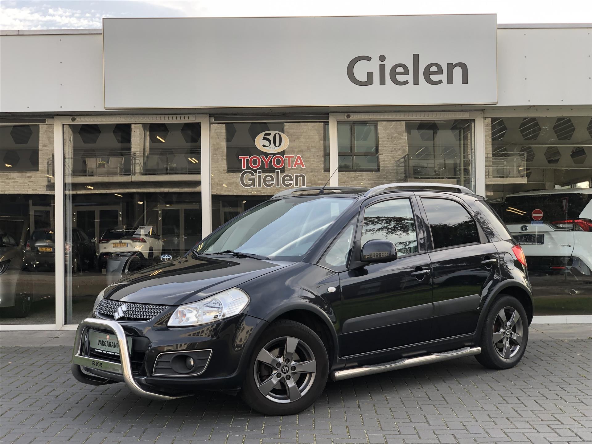 Suzuki SX4 1.6 5D Limited | Cruise control, Lichtmetalen velgen, Treeplanken, Climate control, Fijne instap! 37529343-0.jpg | Autobedrijf Gielen