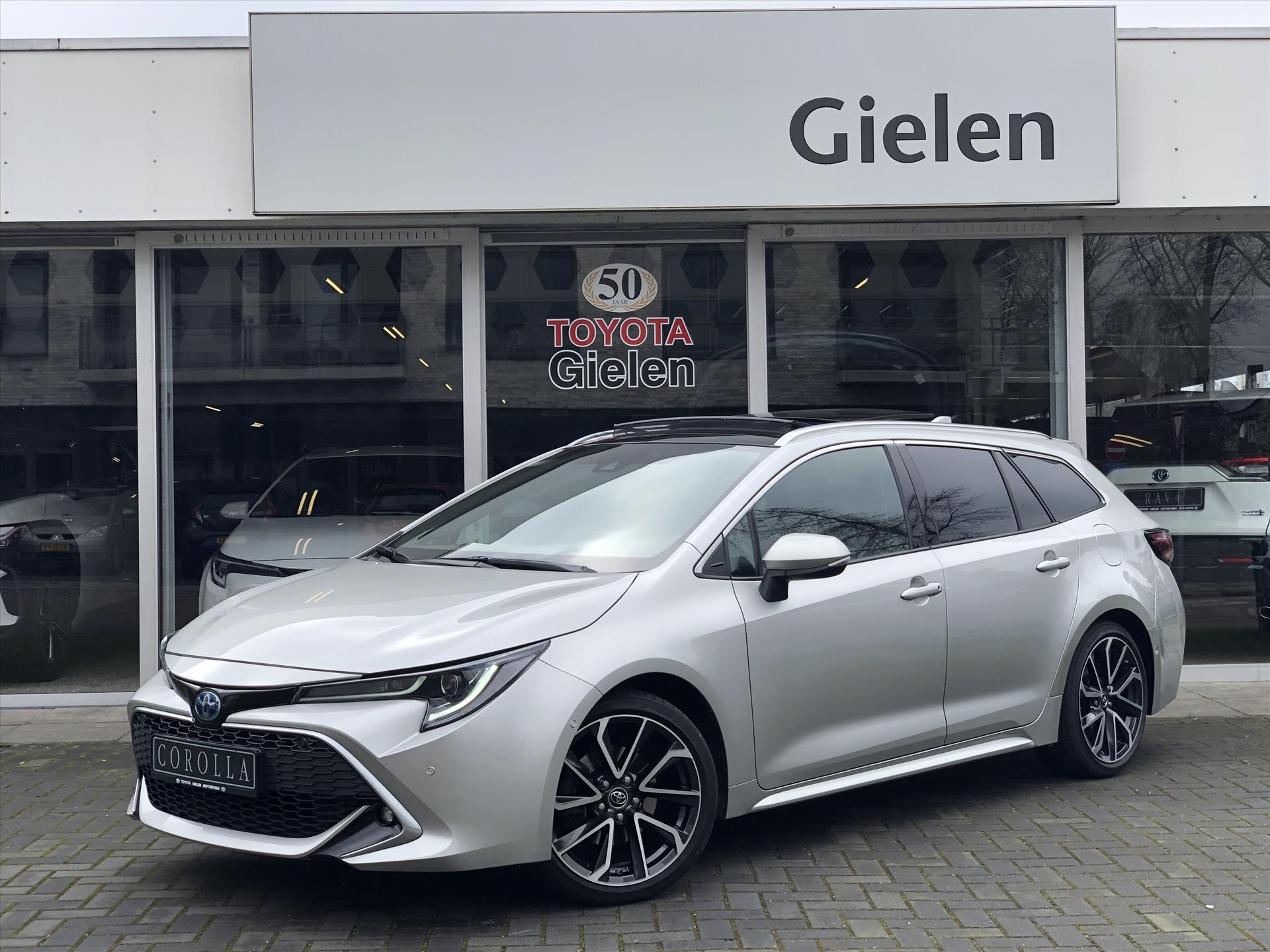 Toyota Corolla Touring Sports 2.0 Hybrid Executive JBL | Panoramisch schuifdak, Trekhaak, Dodehoekherkenning, Stoelverwarming, Half leer/Alcantara 37613644-0.jpg | Autobedrijf Gielen