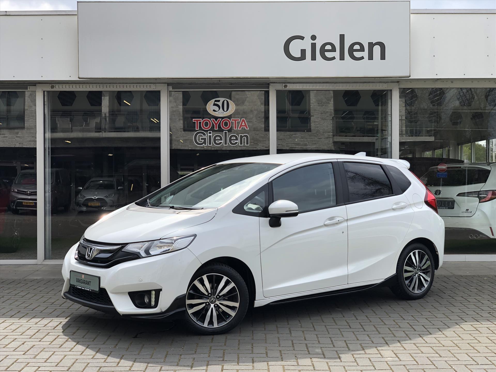 Honda Jazz 1.3 i-VTEC Elegance | Trekhaak, Keyless, Navigatie, Parkeercamera, Parkeersensoren, Stoelverwarming, Zeer compleet! 37898342-0.jpg | Autobedrijf Gielen