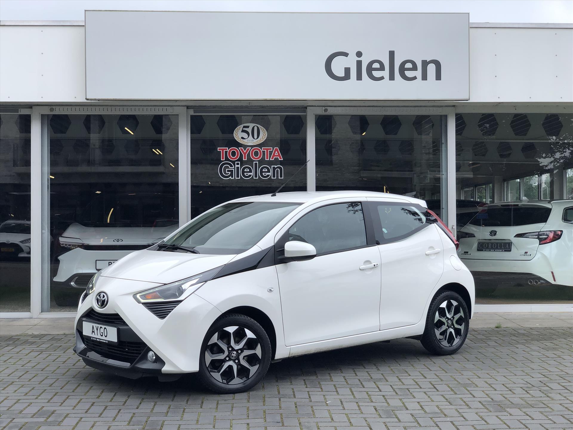 Toyota Aygo 1.0 VVT-i Automaat x-clusiv | Keyless, Navigatie, Schemersensor, Lichtmetalen velgen, Safety Sense 38270339-0.jpg | Autobedrijf Gielen