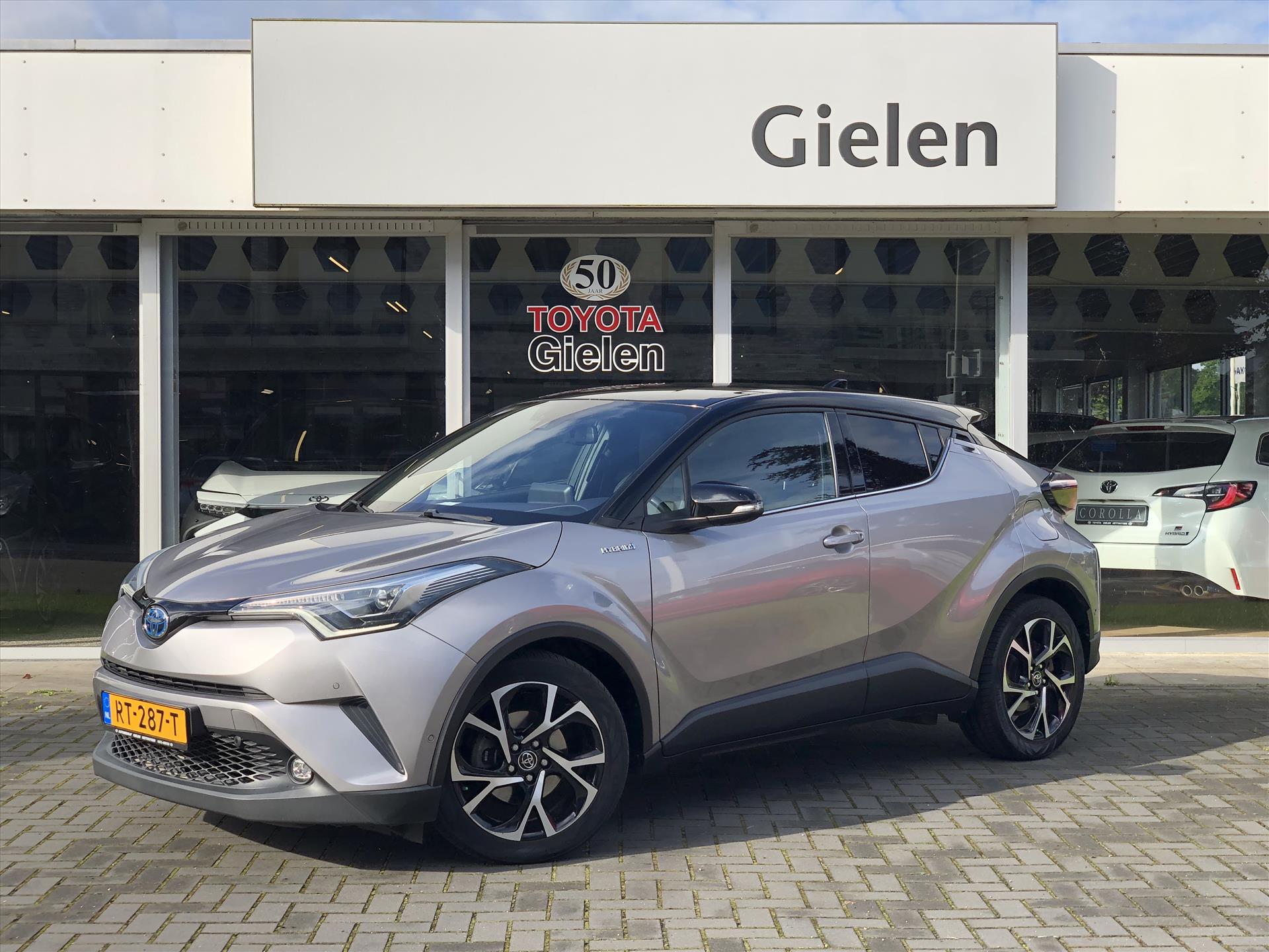 Toyota C-HR 1.8 Hybrid Bi-Tone Plus | Leer, Dodehoekherkenning, Navigatie, LED, Stoel + Stuurverwarming, 18inch, Parkeersensoren, Zeer compl 38387452-0.jpg | Autobedrijf Gielen