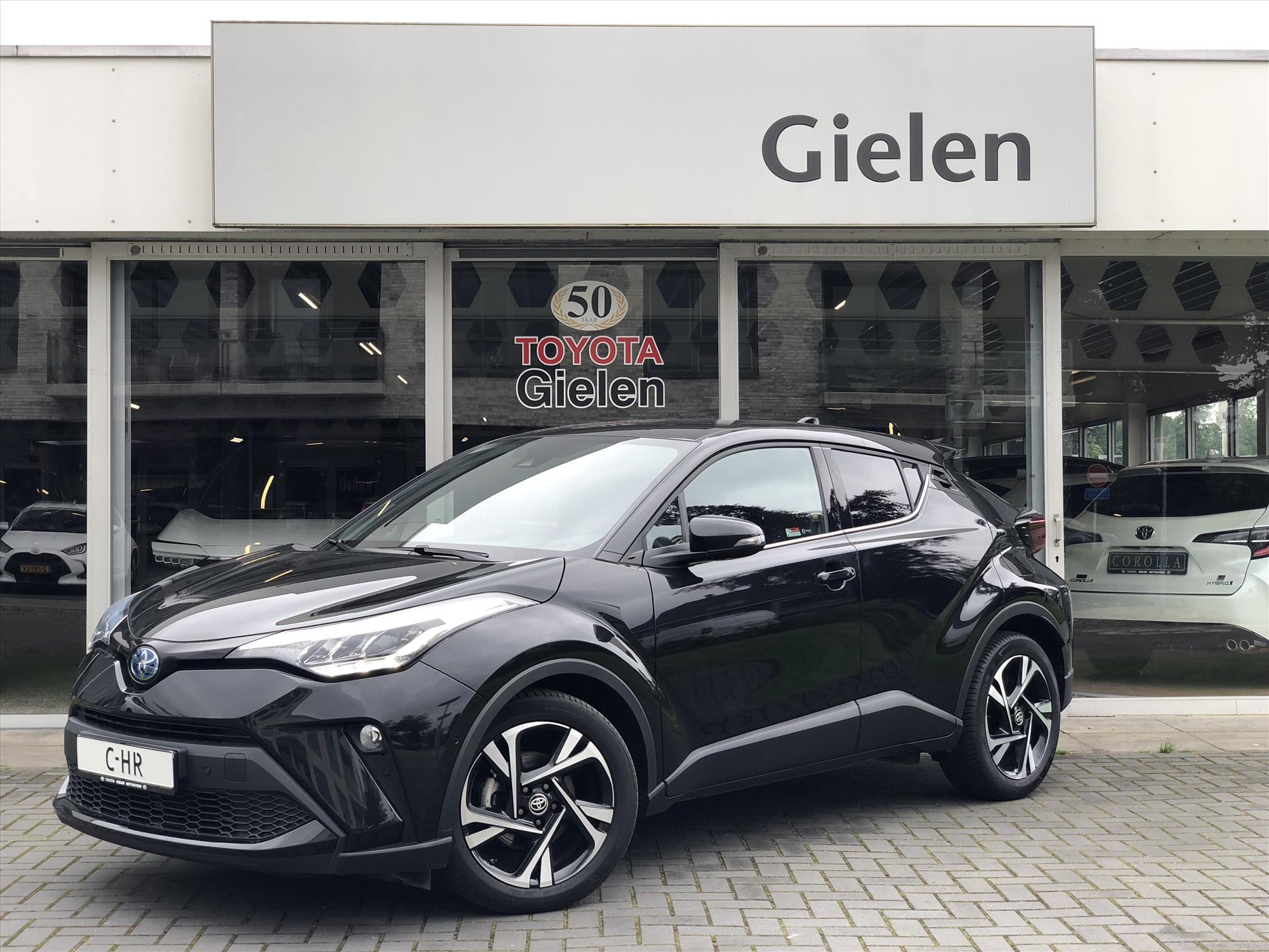 Toyota C-HR 1.8 Hybrid Style | Dodehoekherkenning, Nieuwe multimedia, Parkeersensoren, Stoel + Stuurverwarming, Half leer, 18inch 38505783-0.jpg | Autobedrijf Gielen