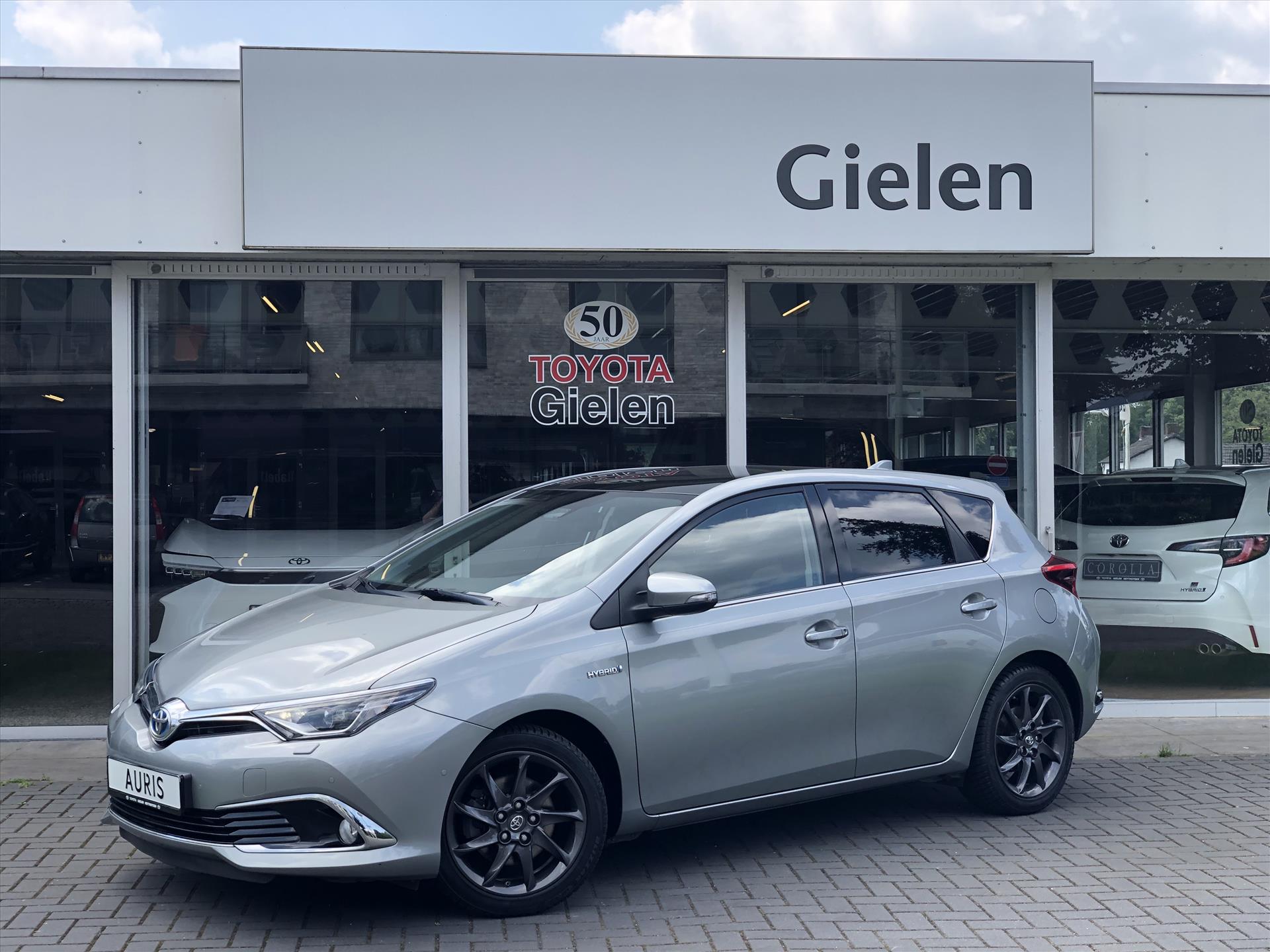 Toyota Auris 1.8 Hybrid Executive | Panoramadak, 17inch, Half Leer, Stoelvewarming, Parkeersensoren, Keyless, Facelift, Navigatie 38599782-0.jpg | Autobedrijf Gielen