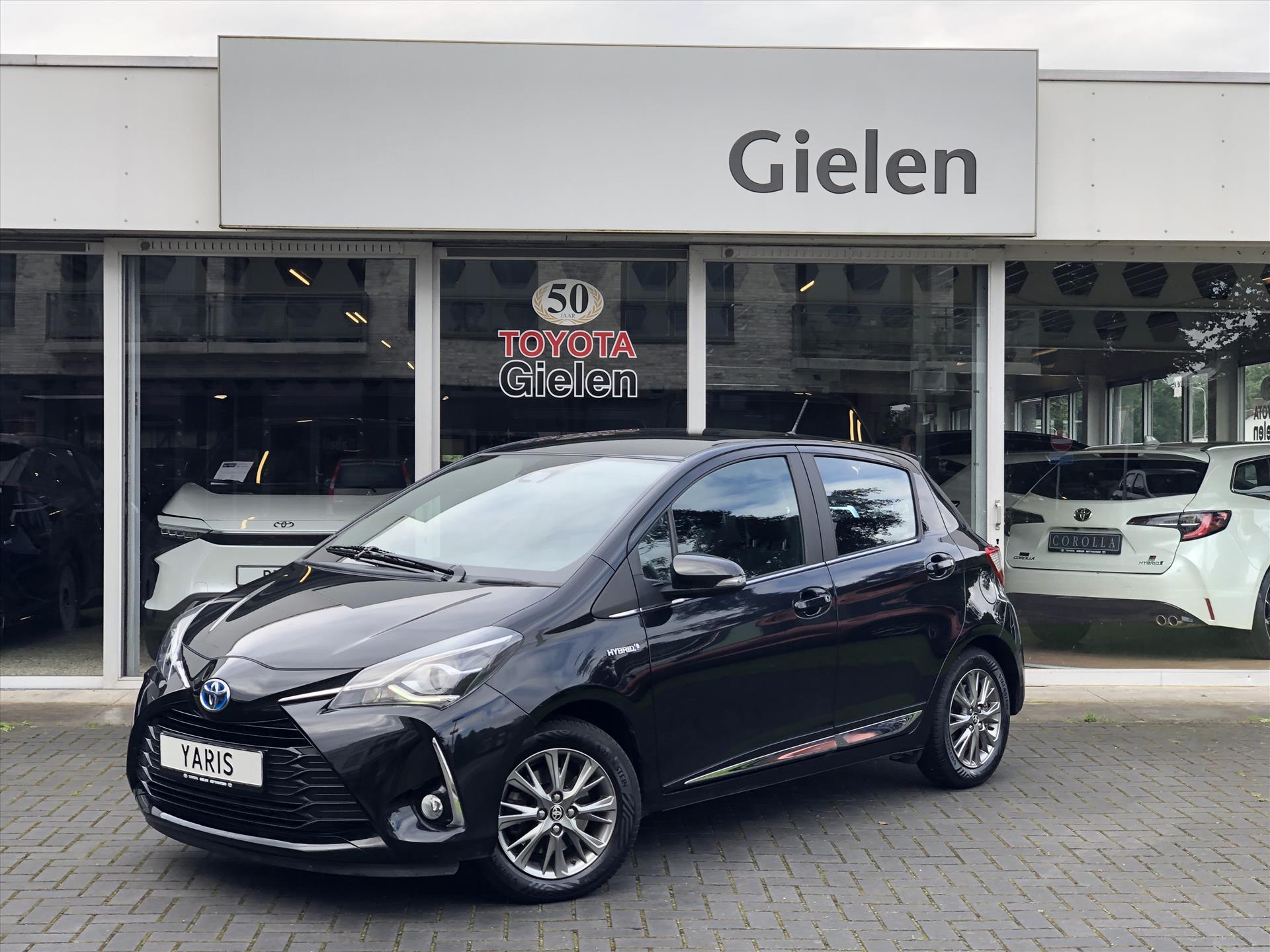 Toyota Yaris 1.5 Hybrid Executive | Navigatie, Half leer, Lichtmetalen velgen, Licht + Regensensor, Bluetooth, Camera 38623168-0.jpg | Autobedrijf Gielen