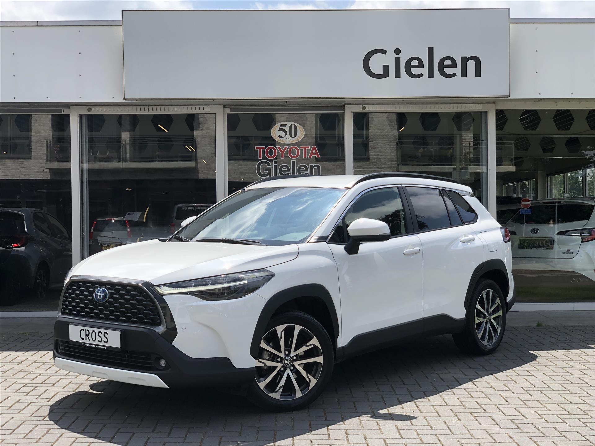 Toyota Corolla Cross 2.0 High Power Hybrid AWD Executive | 4X4, Leer, Stoel + Stuurverwarming, Dodehoekherkenning, Parkeersensoren 38727472-0.jpg | Autobedrijf Gielen