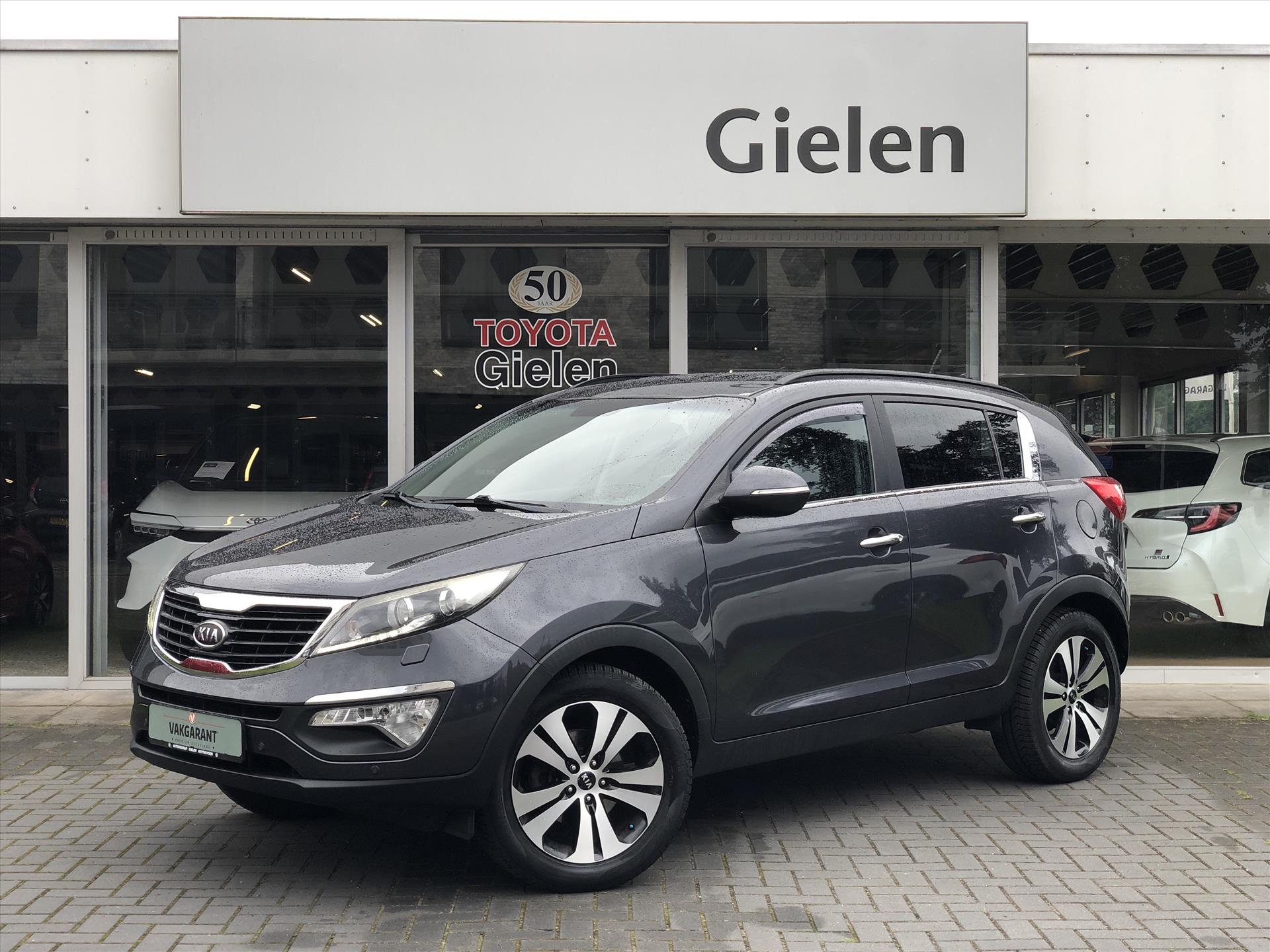 Kia Sportage 2.0 CVVT 163pk Automaat X-clusive | Trekhaak, Half leer, Stoelverwarming, Keyless, Navigatie, Cruise control, 1.600KG Trekgewich 38820313-0.jpg | Autobedrijf Gielen