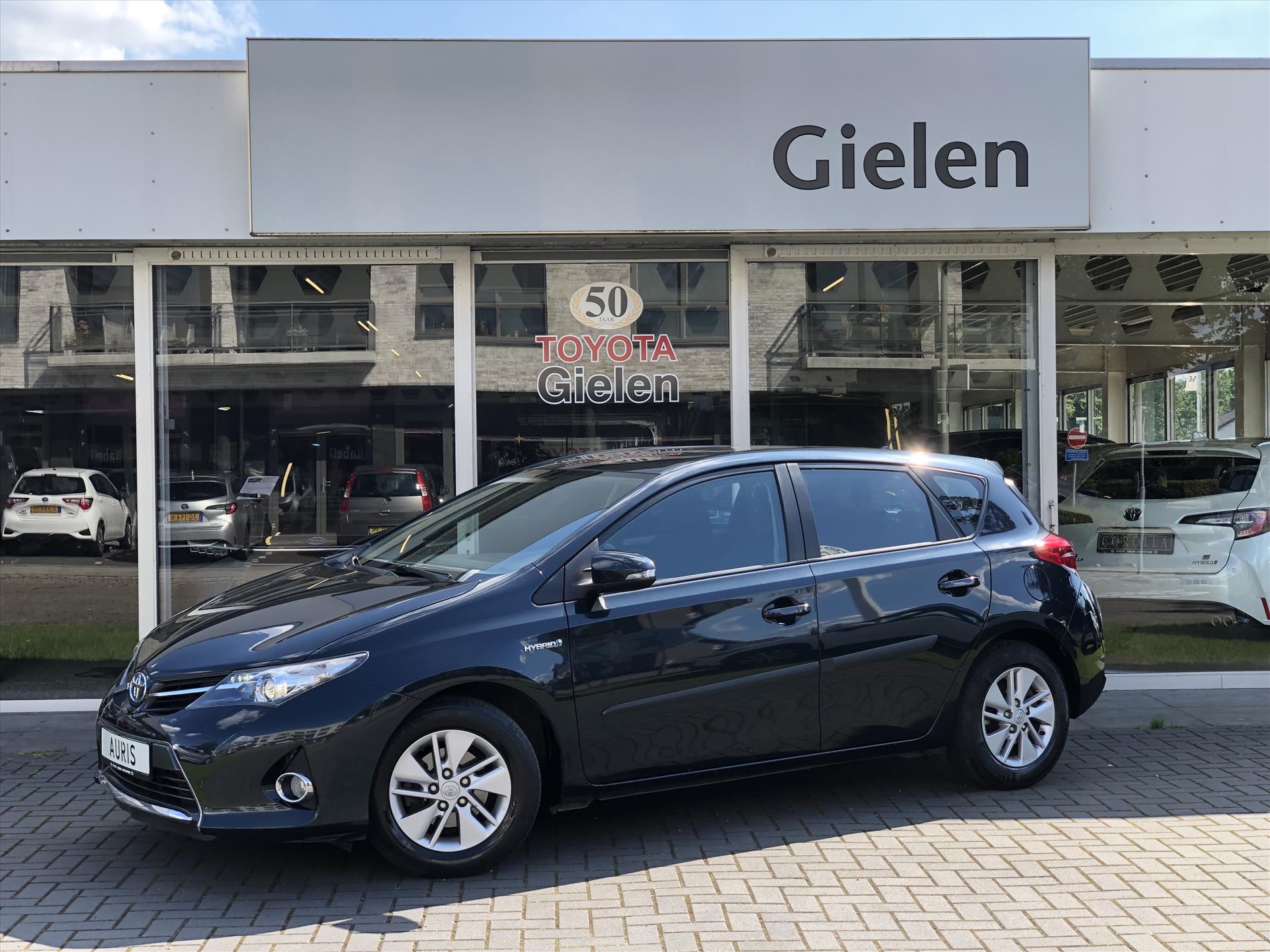 Toyota Auris 1.8 Hybrid Aspiration | 2e eigenaar, Lichtmetalen velgen, Parkeercamera, Bluetooth, Cruise control, Climate control 38862609-0.jpg | Autobedrijf Gielen