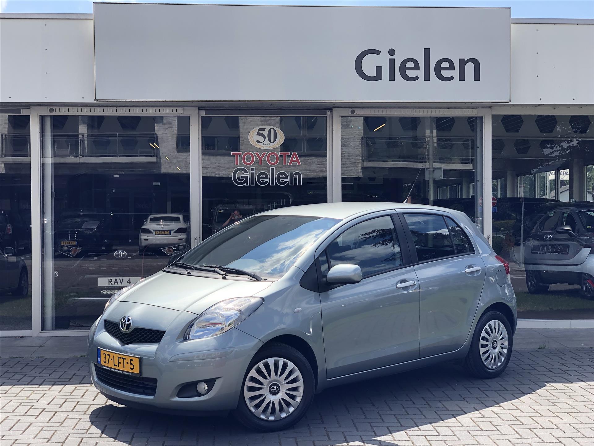 Toyota Yaris 1.3 VVT-i 99pk 5D Aspiration | Eerste eigenaar, Trekhaak, Climate control, Centrale deurvergrendeling, 6-Bak, Uniek weinig KM 39284353-0.jpg | Autobedrijf Gielen