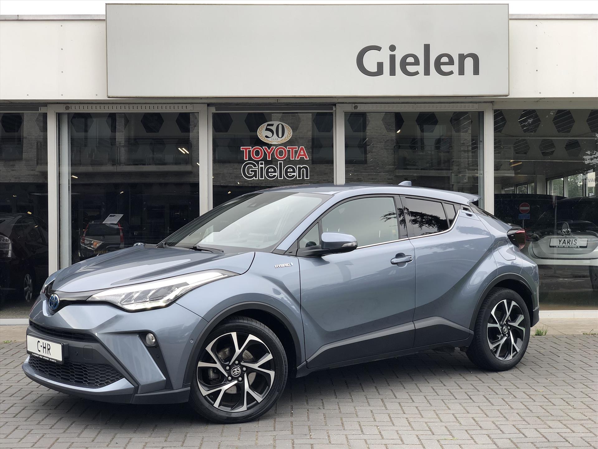 Toyota C-HR 1.8 Hybrid Style | Apple CarPlay/Android Auto, Stoel + Stuurverwarming, Keyless, 18 inch, Dodehoekherkenning, Parkeersensoren 39794205-0.jpg | Autobedrijf Gielen